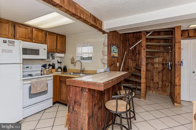 a living room with furniture or couch and a flat screen tv