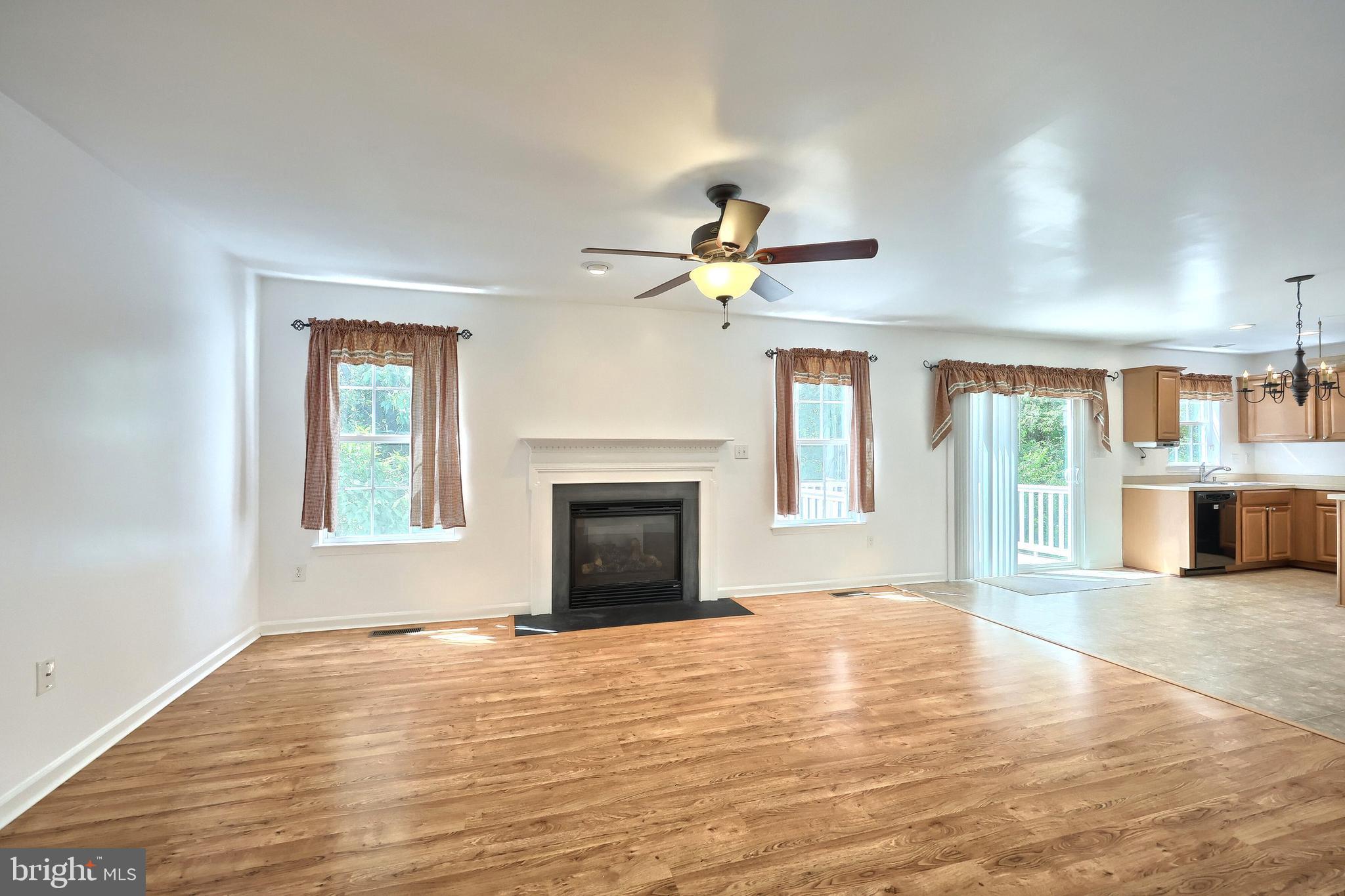 425 Lakeview Drive Spring Grove, PA 17362 - Photo 20 of 51 a view of an empty room with a fireplace and a window