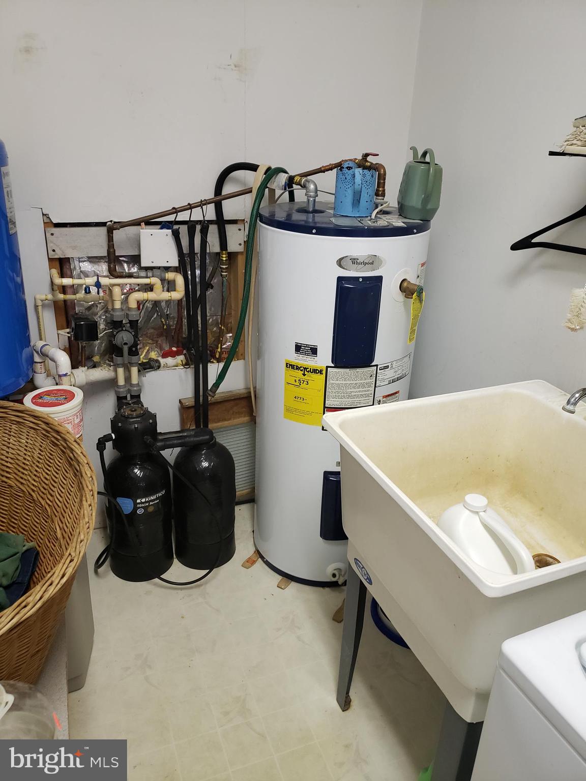 9112 Foulks Road Catlett, VA 20119 - Photo 19 of 24 laundry tub and hot water heater, water treatment
