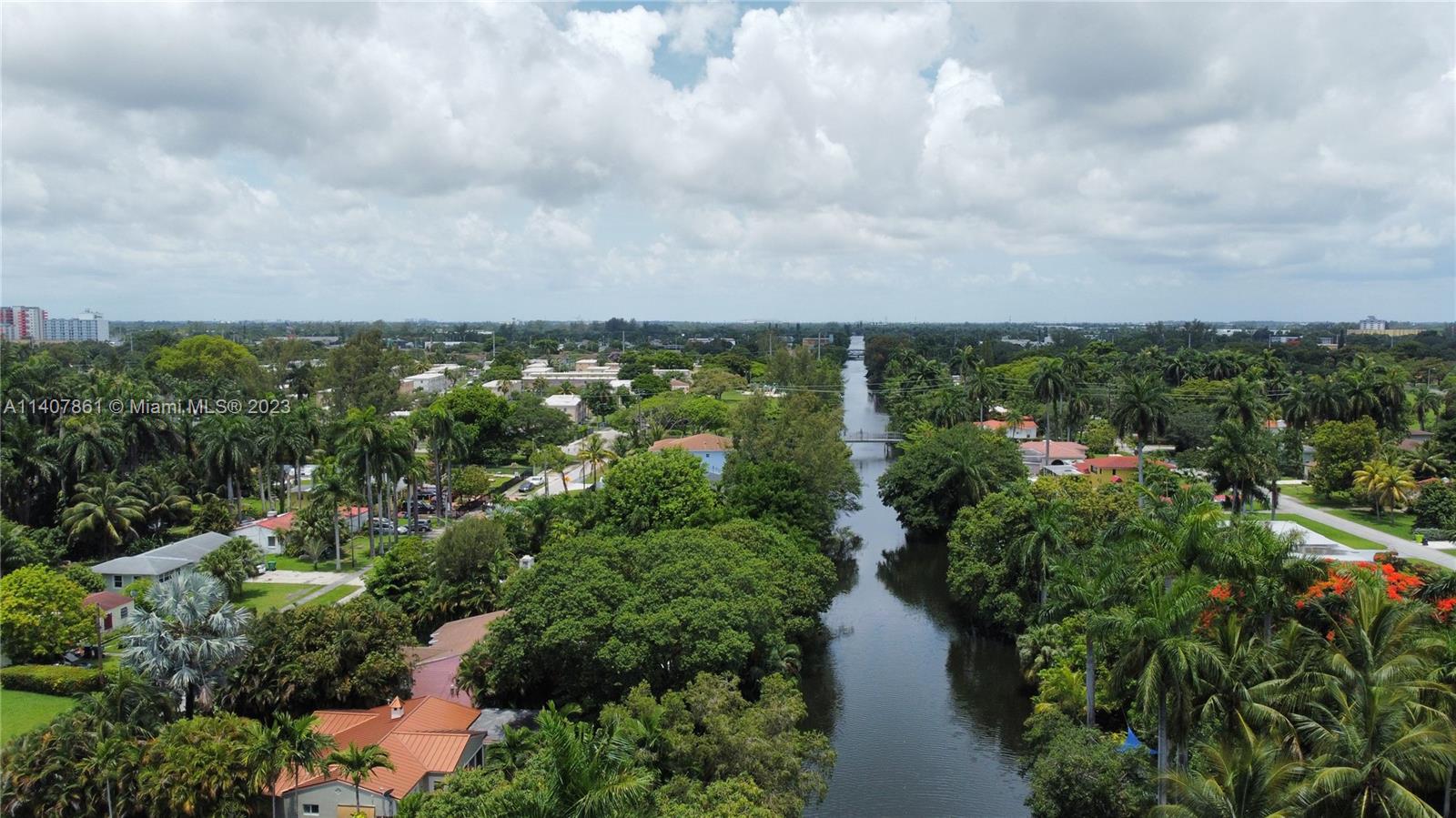 75 Northwest 85th Street Miami, FL 33150 - Photo 8 of 10 a view of a lake with green space