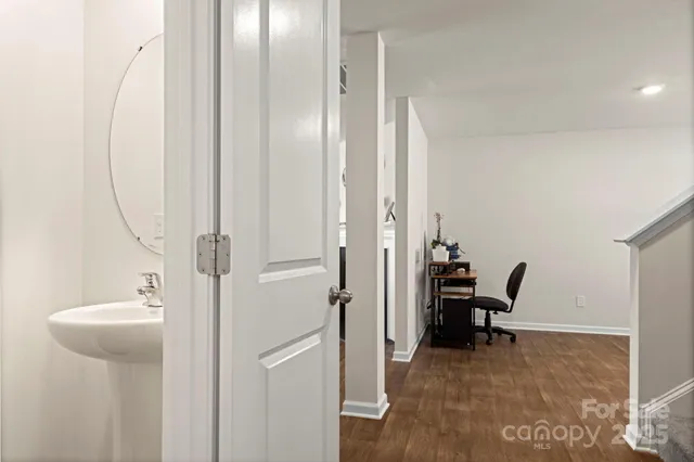 a view of a bathroom with dual sinks