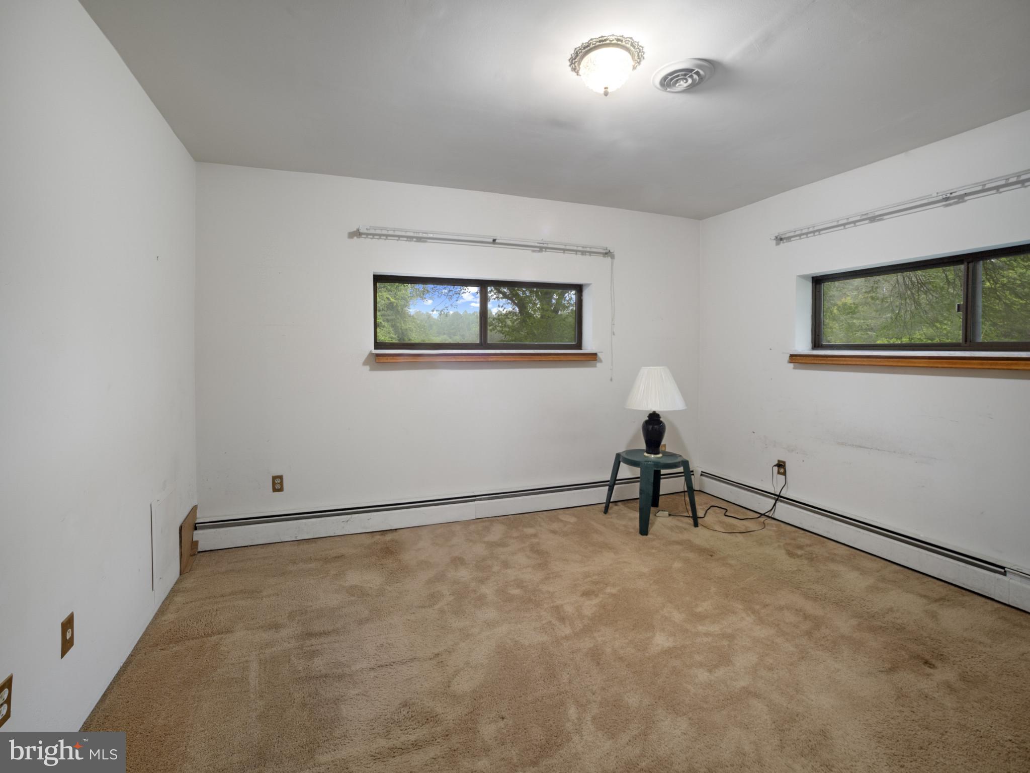372 Sansbury Road Friendship, MD 20758 - Photo 16 of 33 a room with a window and a table