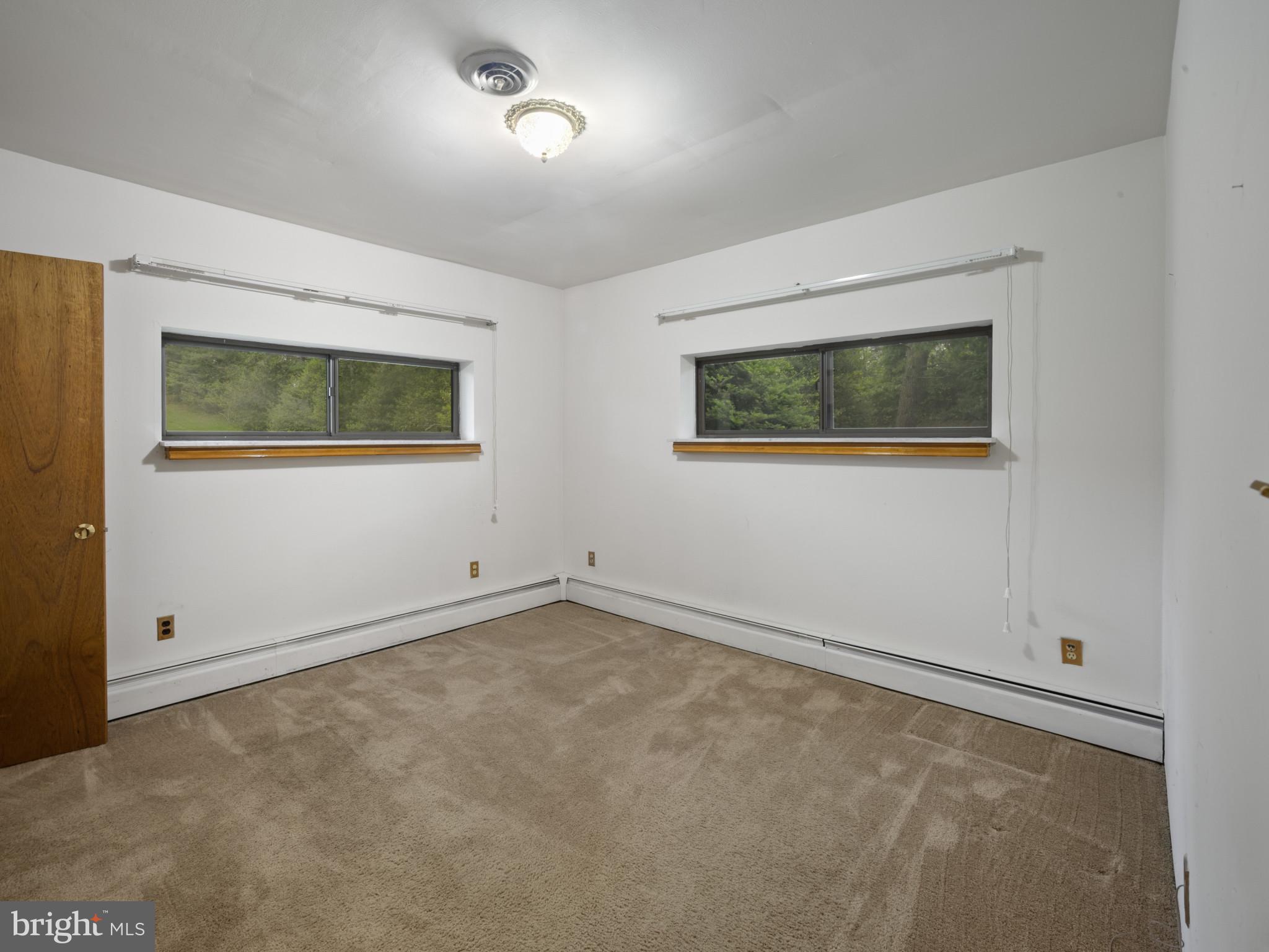 372 Sansbury Road Friendship, MD 20758 - Photo 20 of 33 an empty room with windows