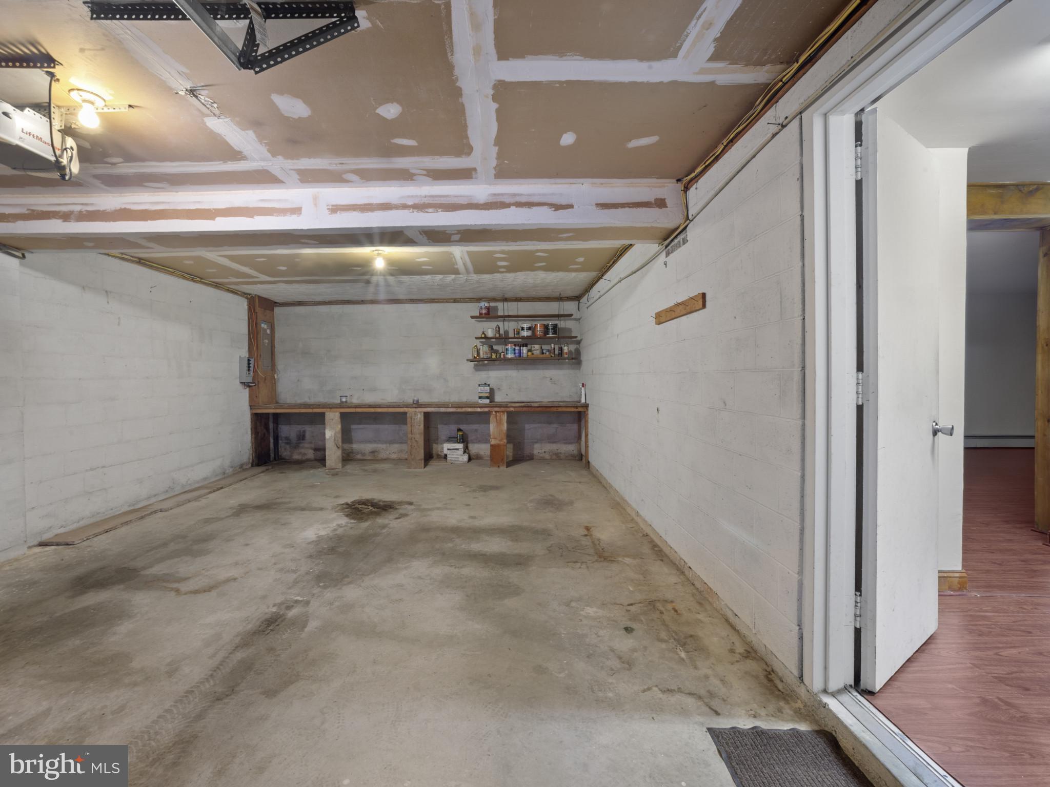 372 Sansbury Road Friendship, MD 20758 - Photo 25 of 33 a view of a hallway with wooden shelves