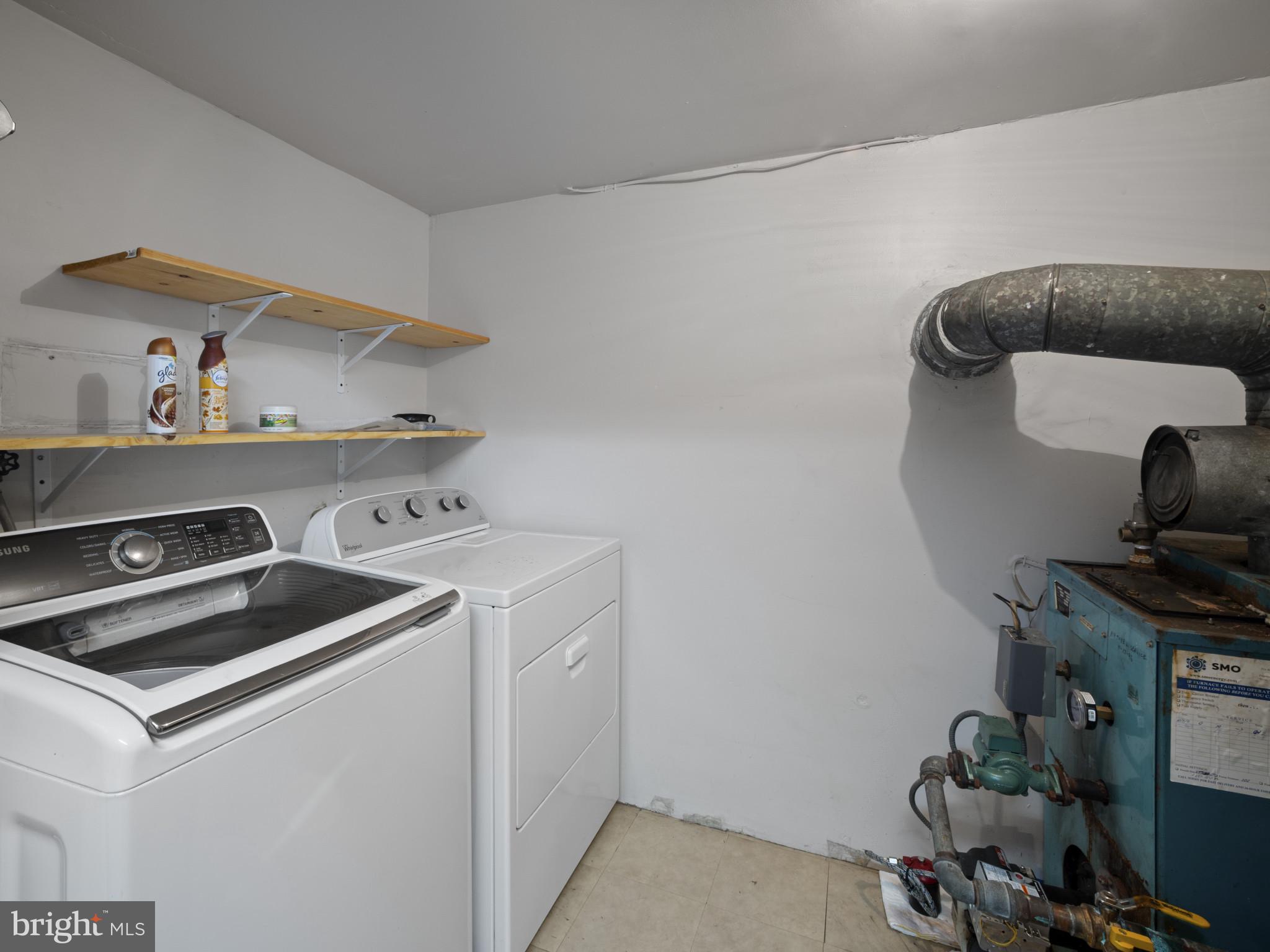 372 Sansbury Road Friendship, MD 20758 - Photo 26 of 33 a utility room with dryer and washer