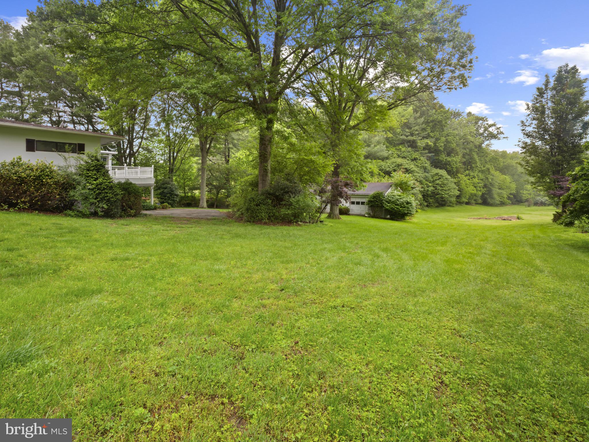 372 Sansbury Road Friendship, MD 20758 - Photo 33 of 33 a view of a big yard with plants and large trees
