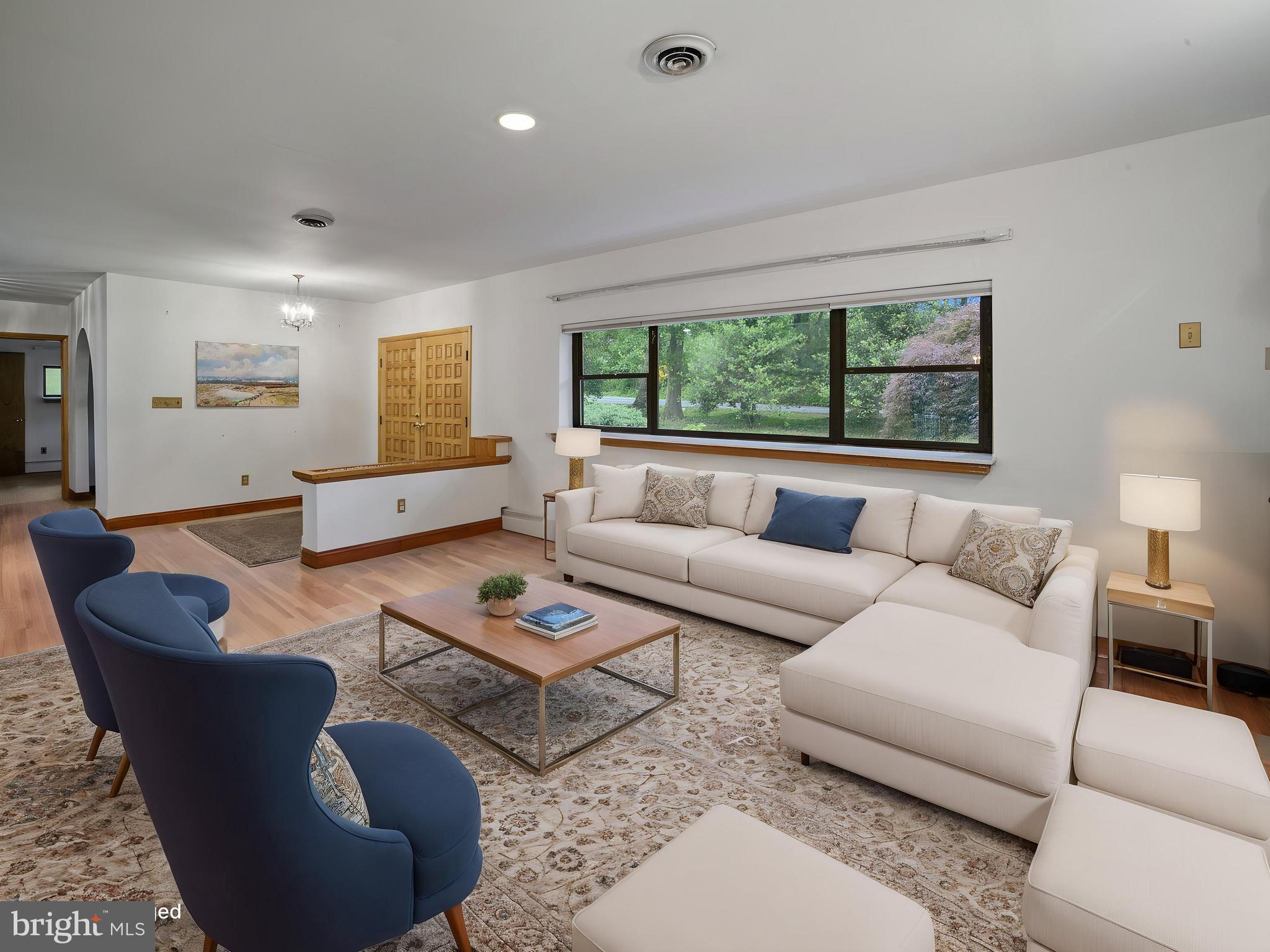 372 Sansbury Road Friendship, MD 20758 - Photo 7 of 33 a living room with furniture and a large window