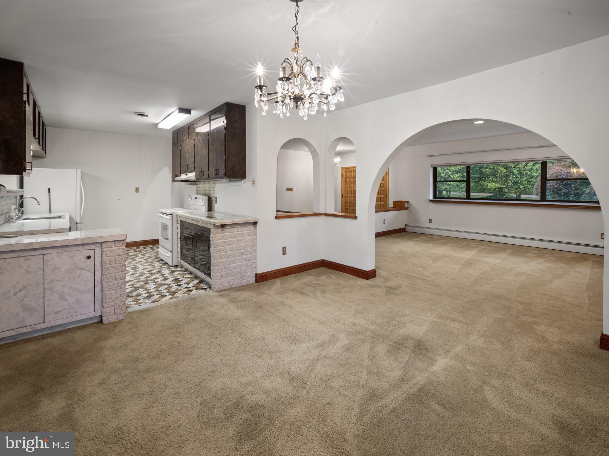 372 Sansbury Road Friendship, MD 20758 - Photo 8 of 33 a spacious en suite bathroom with a sink and a large mirror