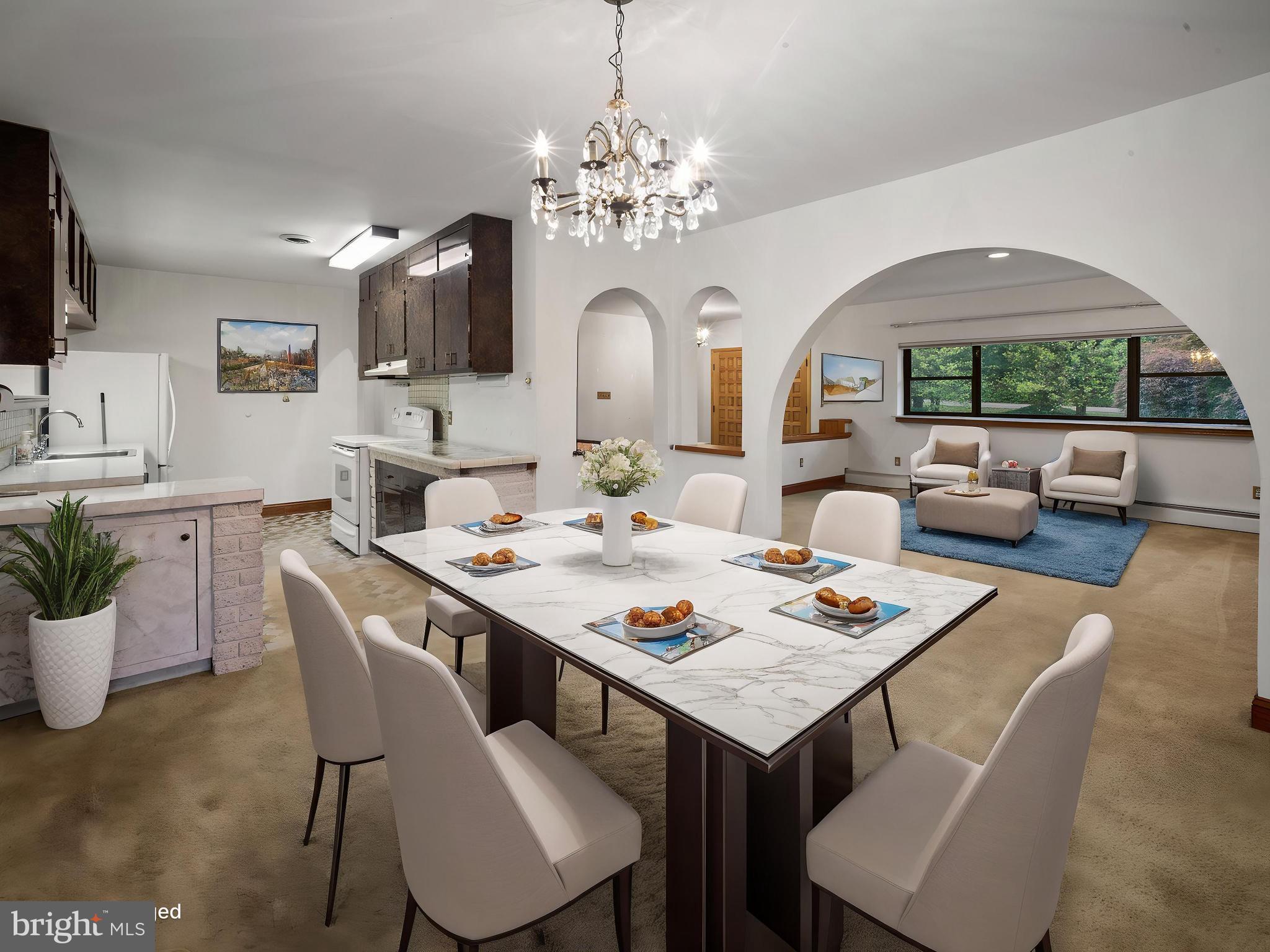 372 Sansbury Road Friendship, MD 20758 - Photo 9 of 33 a view of a dining room with furniture a chandelier and wooden floor