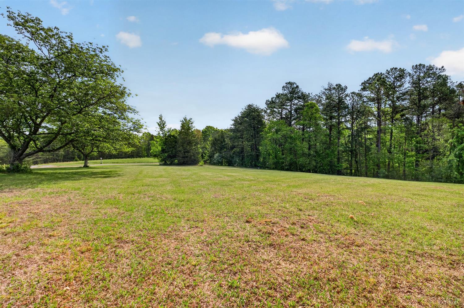 1002 Homeplace Road Rustburg, VA 24588 - Photo 41 of 48 a view of an outdoor space and a yard