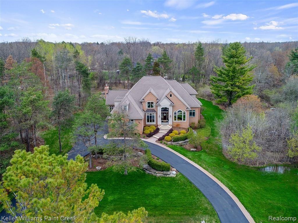 Welcome to 525 Sheldon Court, located on a wooded, private 2.5 acre lot.