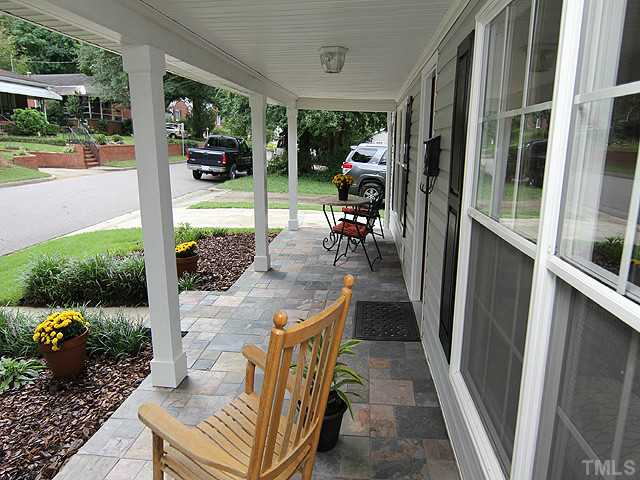 609 Latta Street Raleigh, NC 27607 - Photo 2 of 13 a view of a porch with chairs and backyard