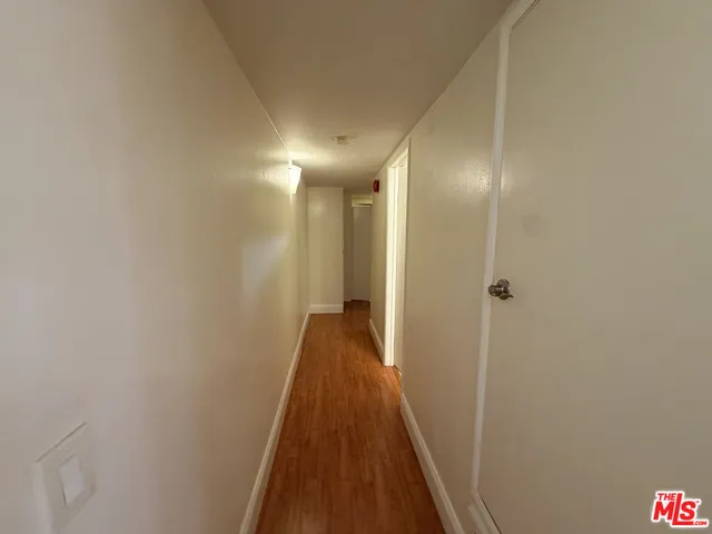 a view of a bathroom from the hallway