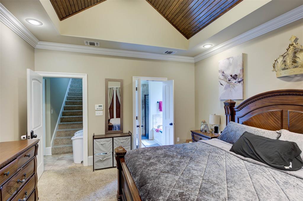 334 Wood Springs Haughton, LA 71037 - Photo 10 of 25 a bedroom with a bed and a mirror