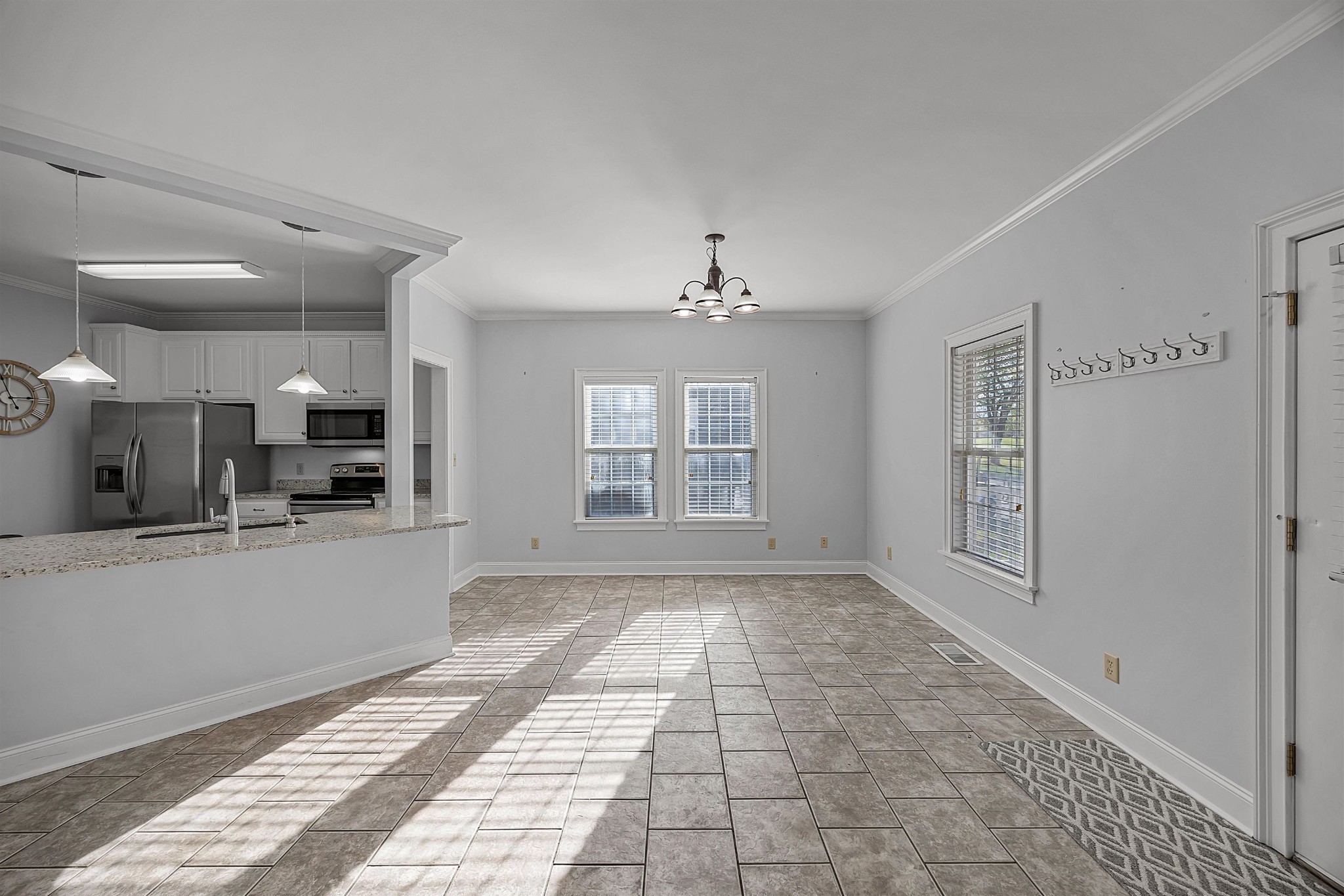 6 Laura Lane Iuka, MS 38852 - Photo 11 of 25 a view of an empty room with kitchen and window