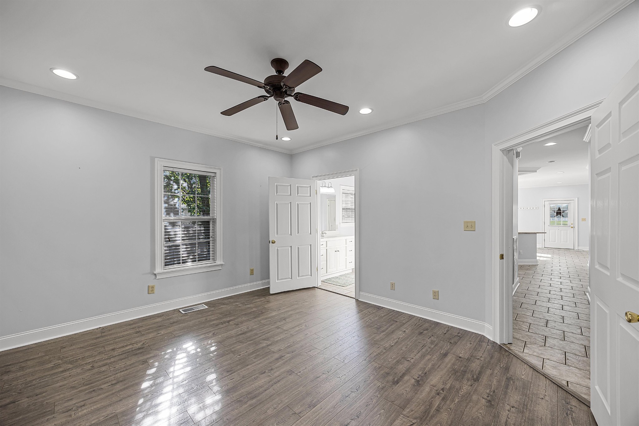 6 Laura Lane Iuka, MS 38852 - Photo 12 of 25 a view of a big room with wooden floor and windows