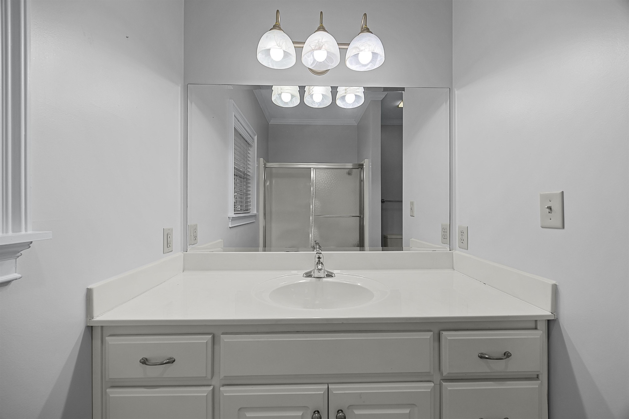 6 Laura Lane Iuka, MS 38852 - Photo 18 of 25 a bathroom with a sink and a mirror