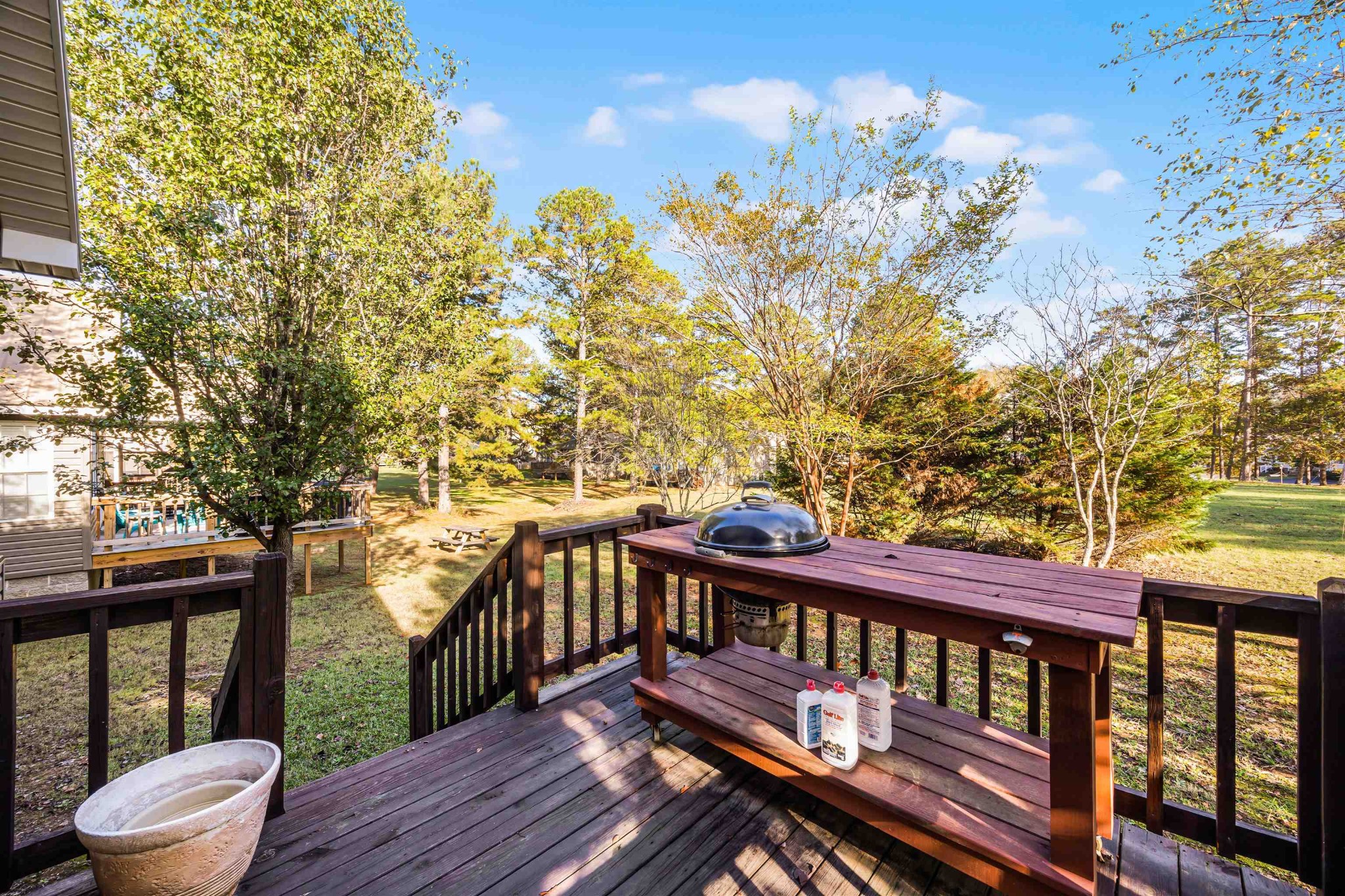 6 Laura Lane Iuka, MS 38852 - Photo 22 of 25 a view of a roof deck with wooden floor and fence