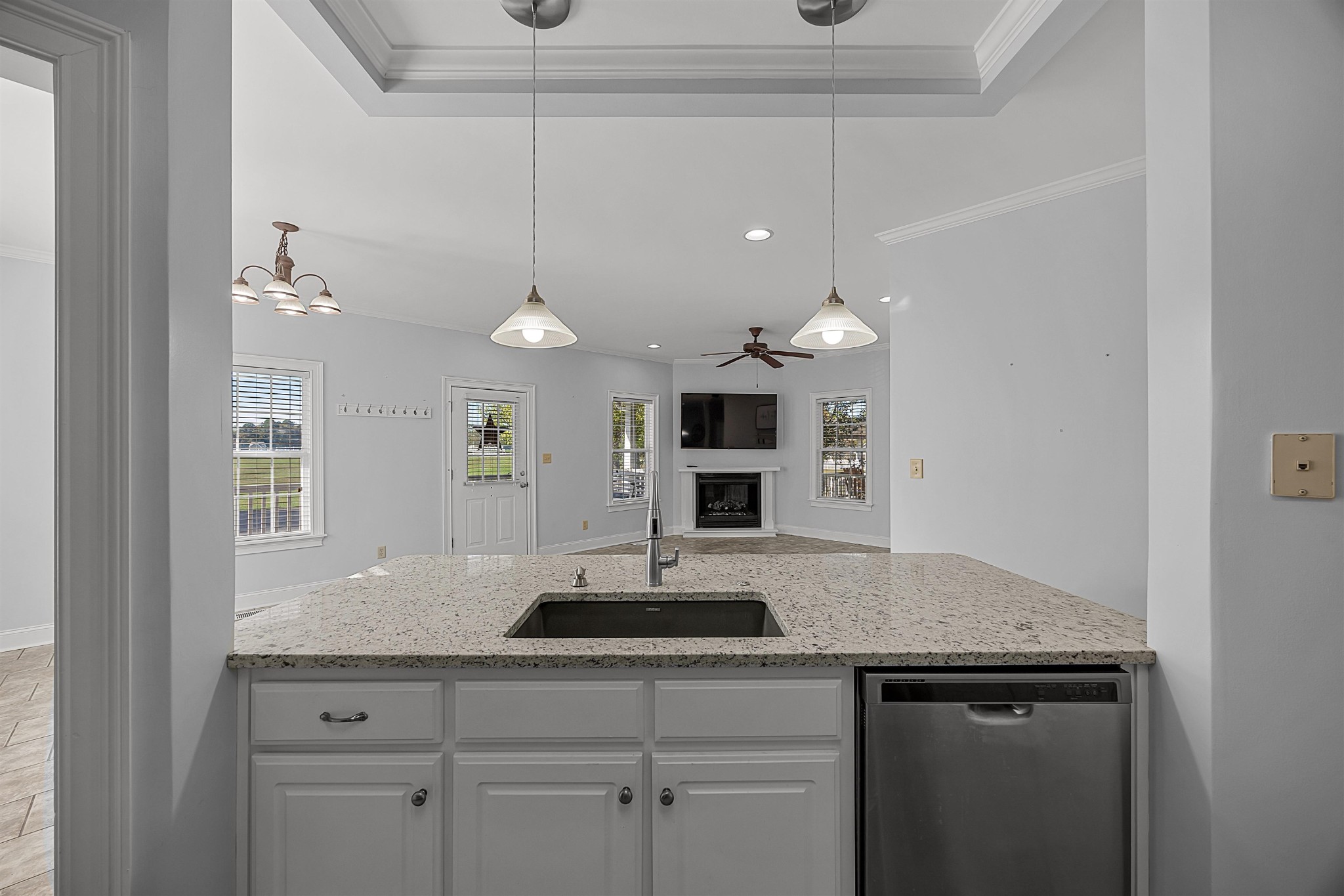 6 Laura Lane Iuka, MS 38852 - Photo 5 of 25 a view of a kitchen counter space a sink and dishwasher with wooden floor