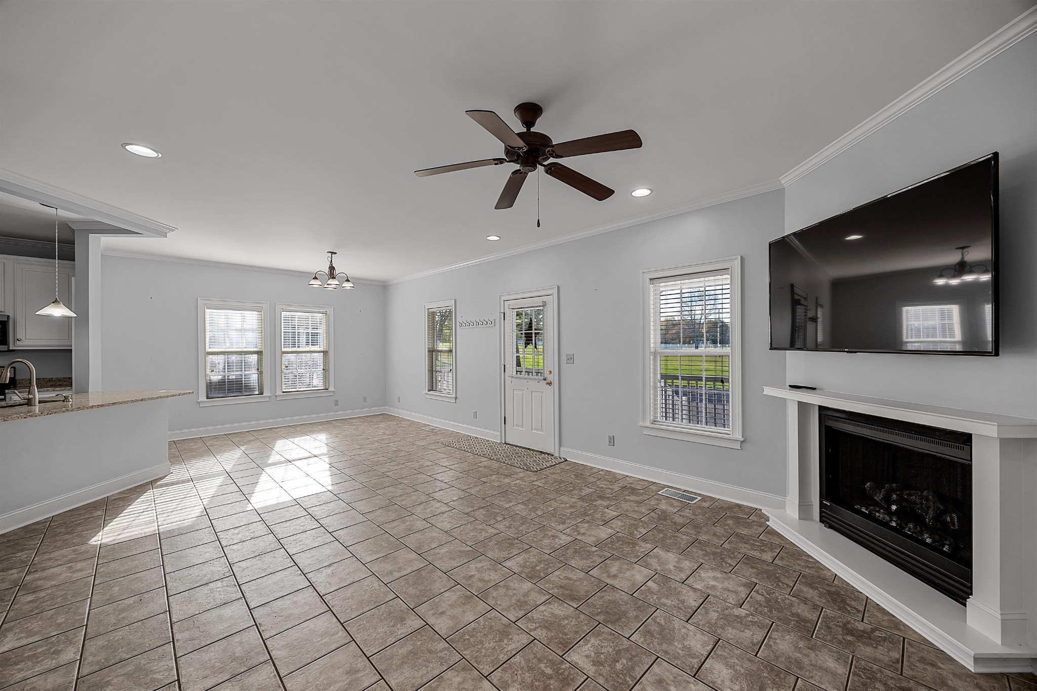 6 Laura Lane Iuka, MS 38852 - Photo 6 of 25 a view of livingroom and fireplace with window