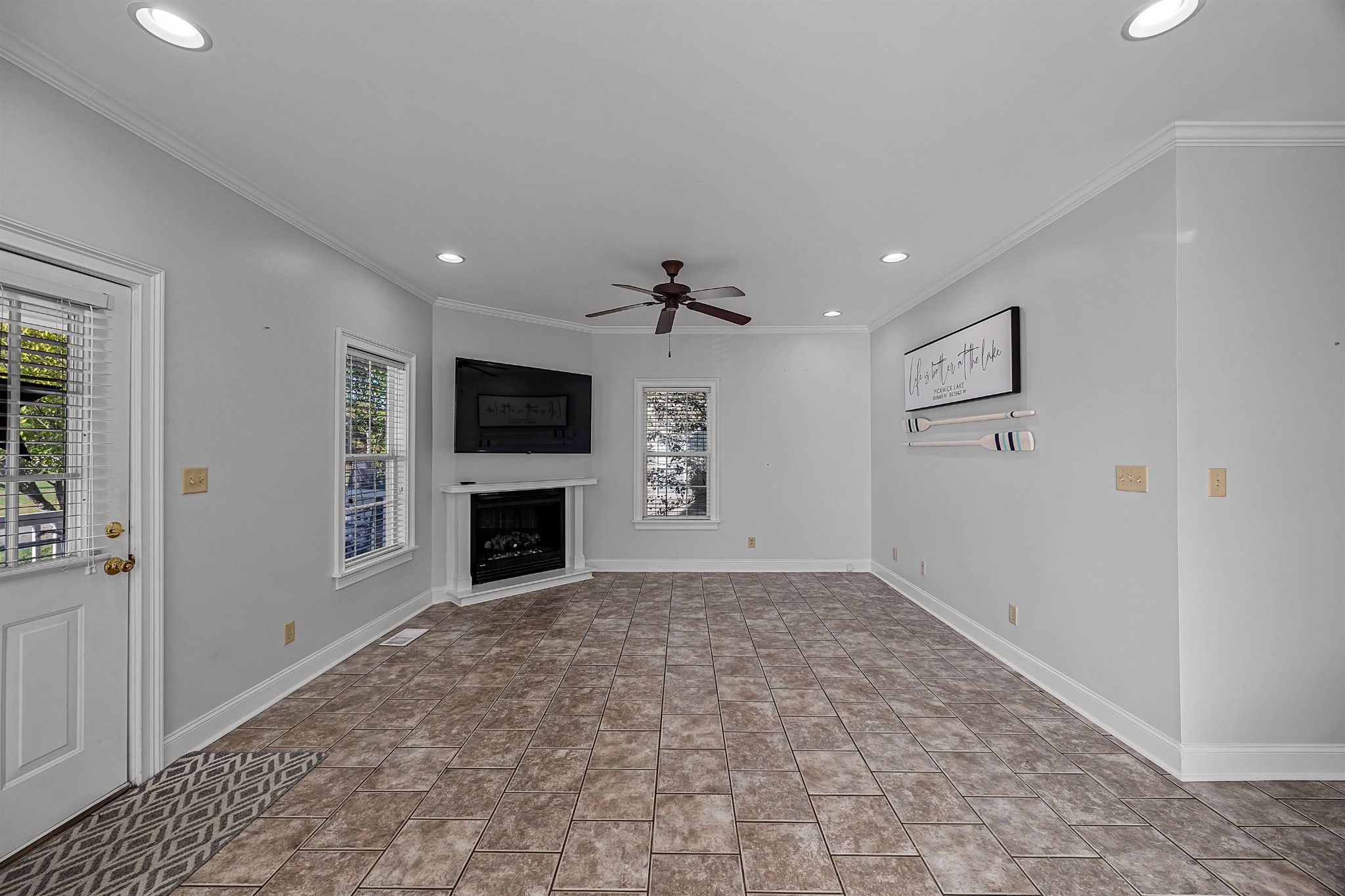 6 Laura Lane Iuka, MS 38852 - Photo 7 of 25 a view of a livingroom with a fireplace cabinet and windows