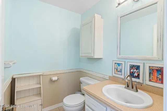 a bedroom with a bed couch and window