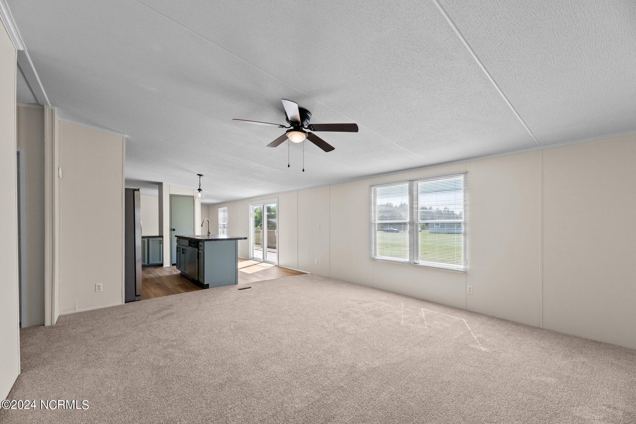 516 Cicero Riggs Road Cove City, NC 28523 - Photo 12 of 23 Additional Family Room View