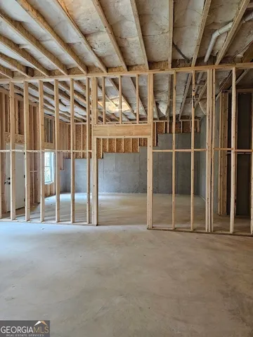 a view of an empty room with sliding door