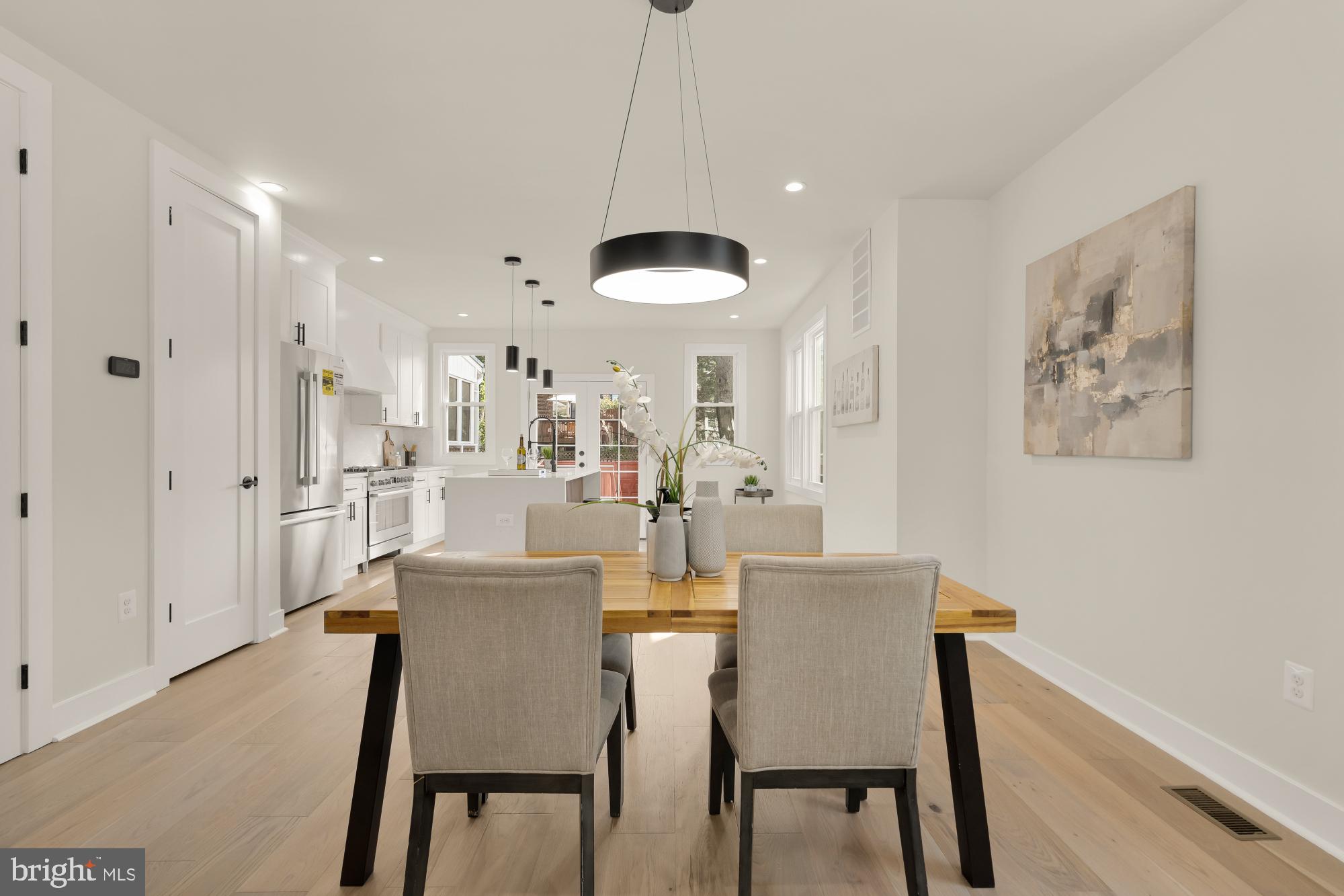 5331 42nd Street Northwest Washington, DC 20015 - Photo 11 of 51 a view of a dining room with furniture and wooden floor