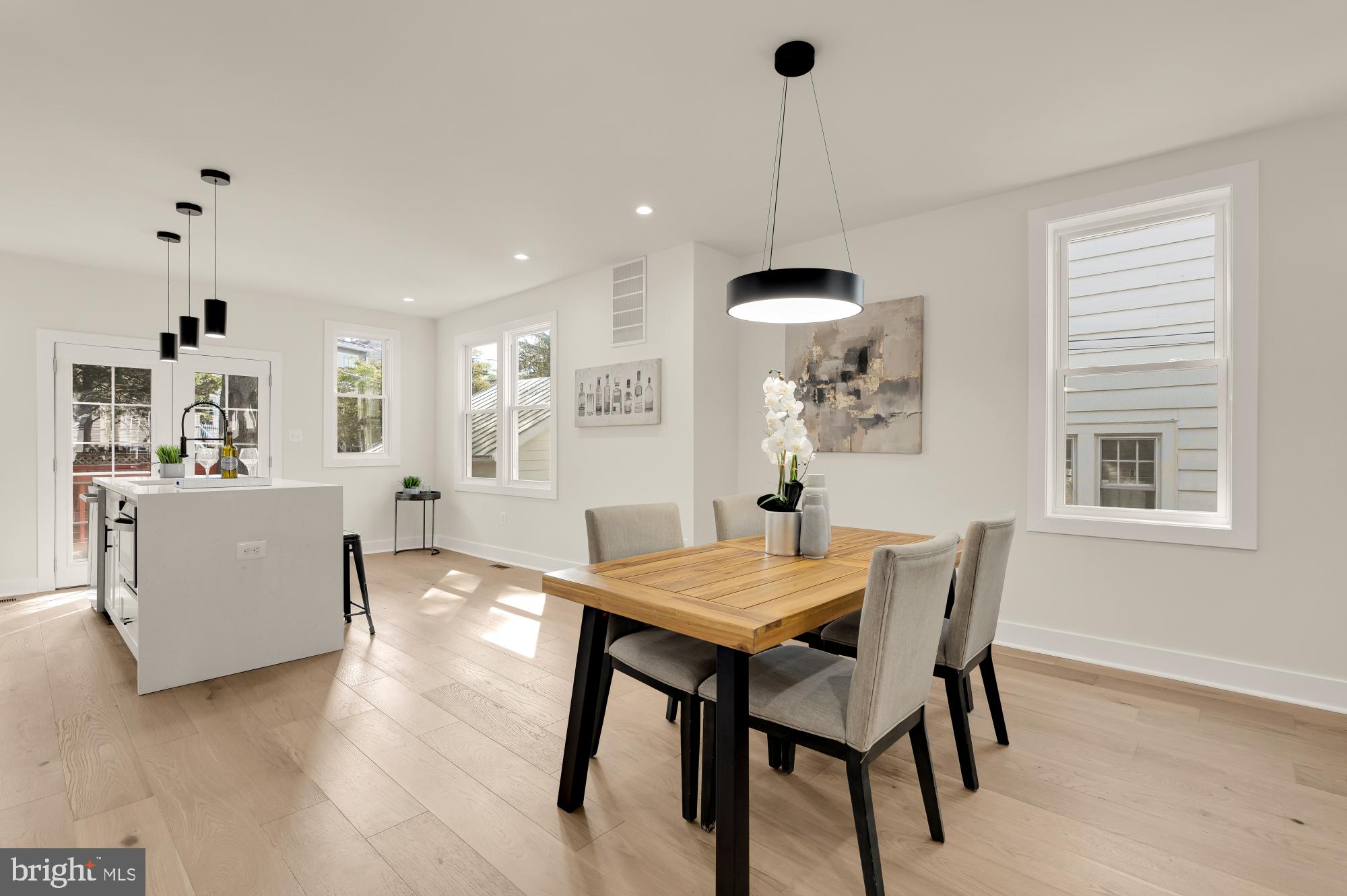 5331 42nd Street Northwest Washington, DC 20015 - Photo 12 of 51 a view of a dining room with furniture and wooden floor