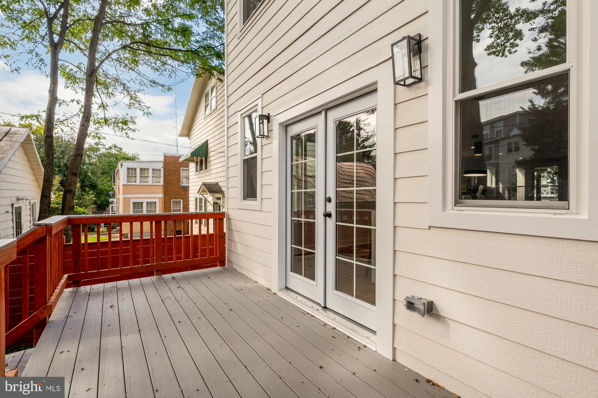 5331 42nd Street Northwest Washington, DC 20015 - Photo 19 of 51 a view of a wooden deck with a yard