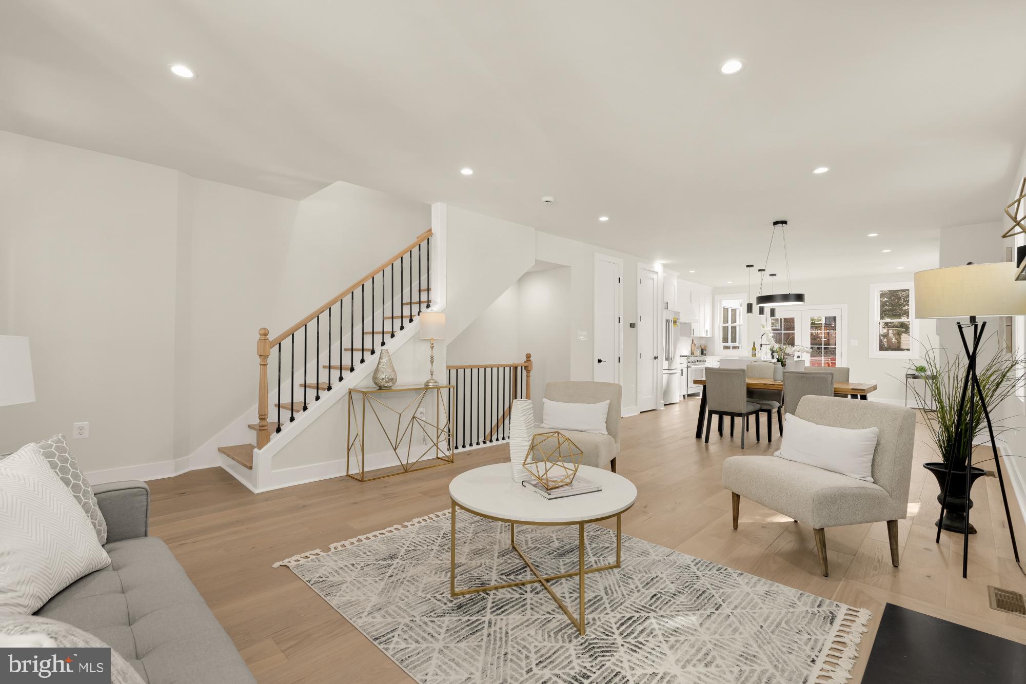 5331 42nd Street Northwest Washington, DC 20015 - Photo 2 of 51 a living room with furniture kitchen view and a dining table