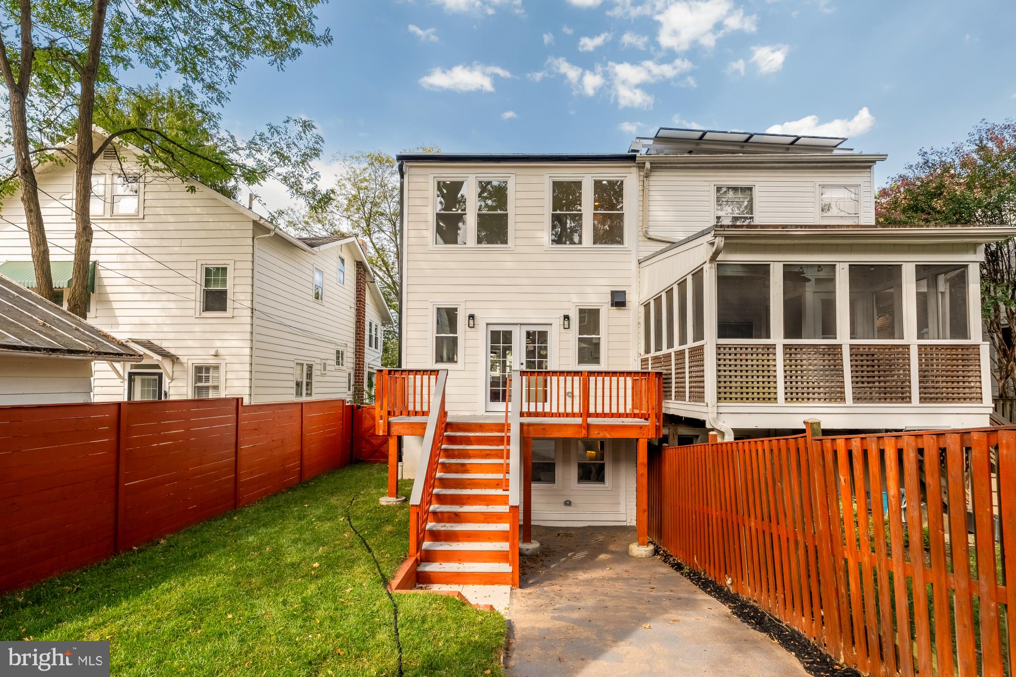 5331 42nd Street Northwest Washington, DC 20015 - Photo 22 of 51 a front view of a house with a yard