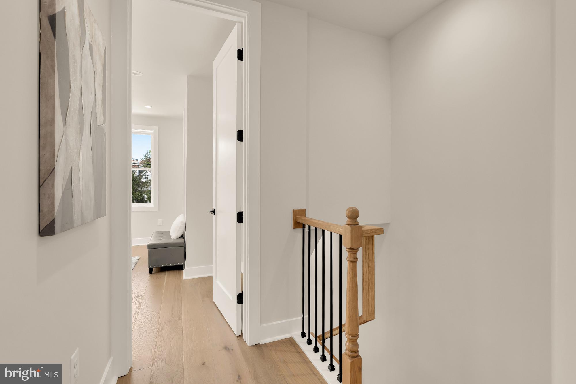 5331 42nd Street Northwest Washington, DC 20015 - Photo 25 of 51 a view of a hallway with wooden floor and closet