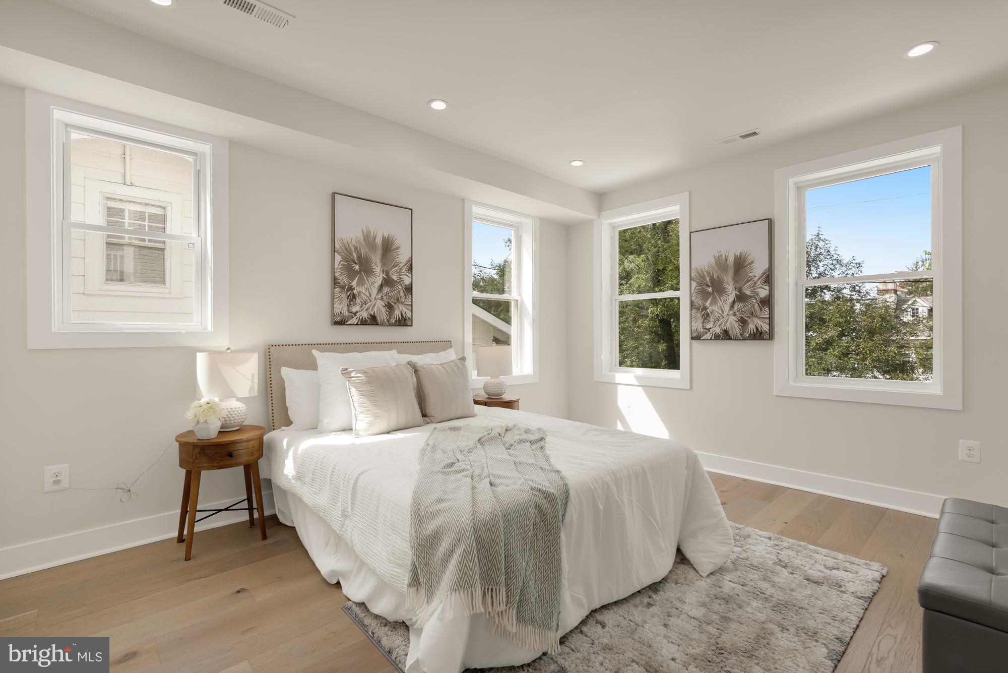 5331 42nd Street Northwest Washington, DC 20015 - Photo 26 of 51 a bedroom with a large bed and a window