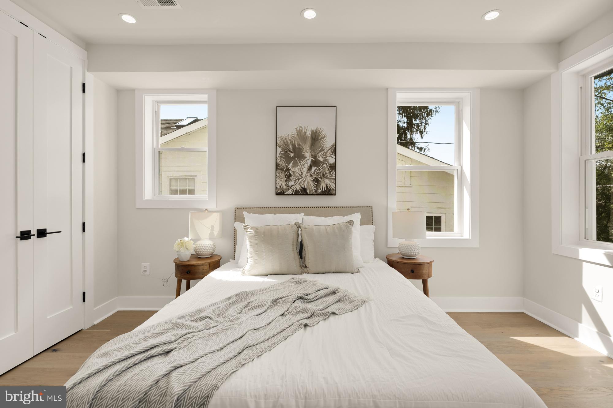 5331 42nd Street Northwest Washington, DC 20015 - Photo 27 of 51 a bedroom with a large bed and a window