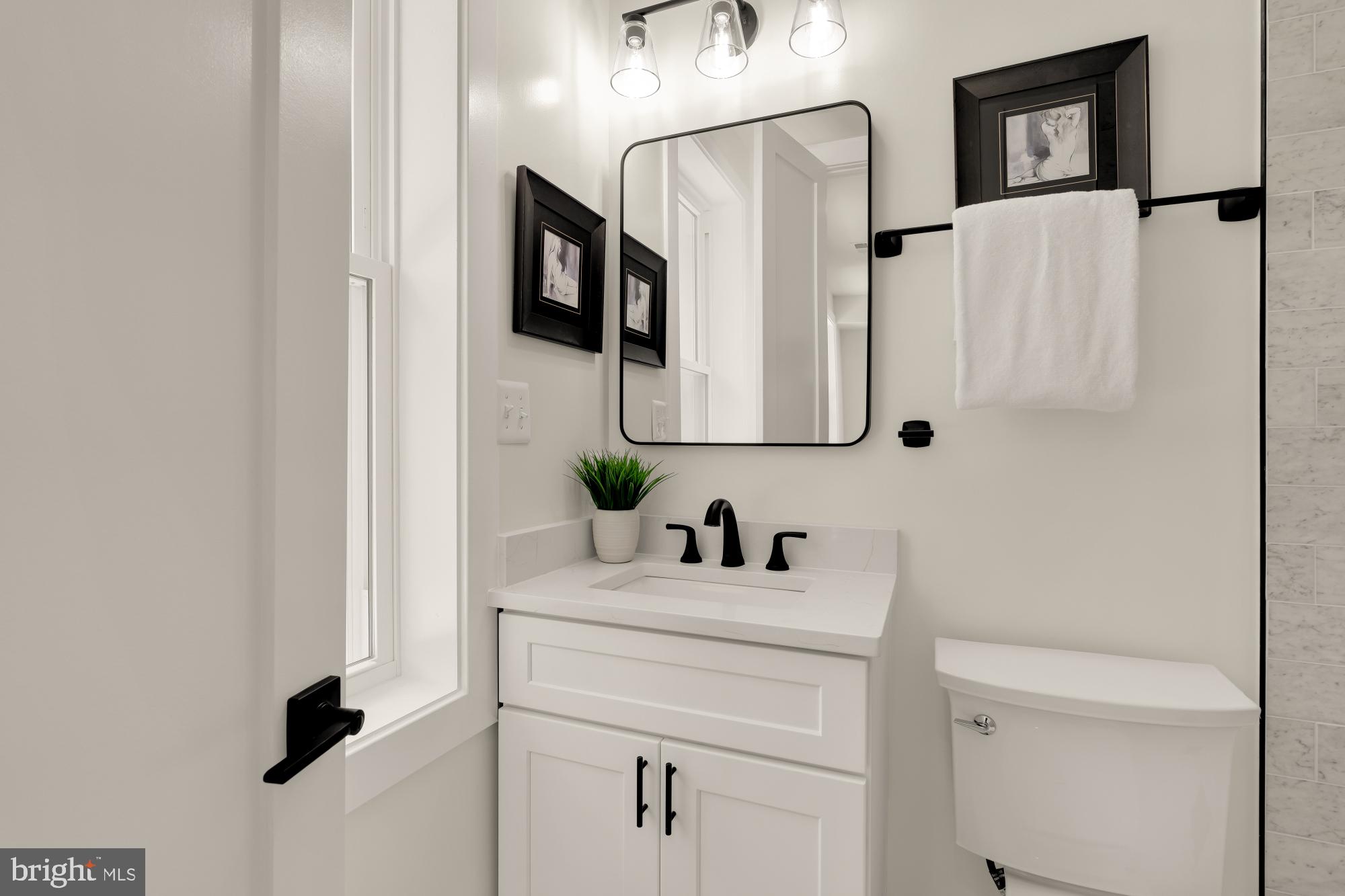 5331 42nd Street Northwest Washington, DC 20015 - Photo 32 of 51 a bathroom with a sink and a mirror