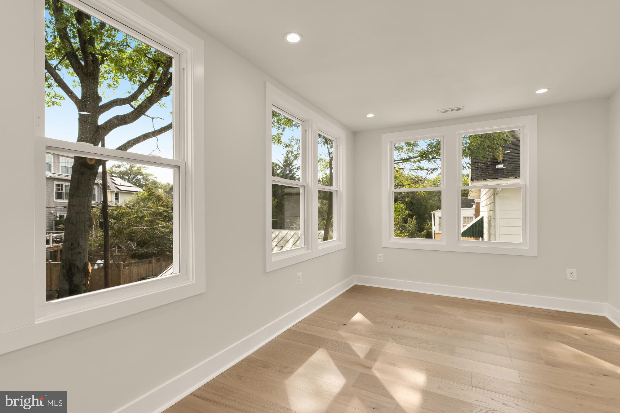 5331 42nd Street Northwest Washington, DC 20015 - Photo 34 of 51 a view of an empty room with a window and a kitchen