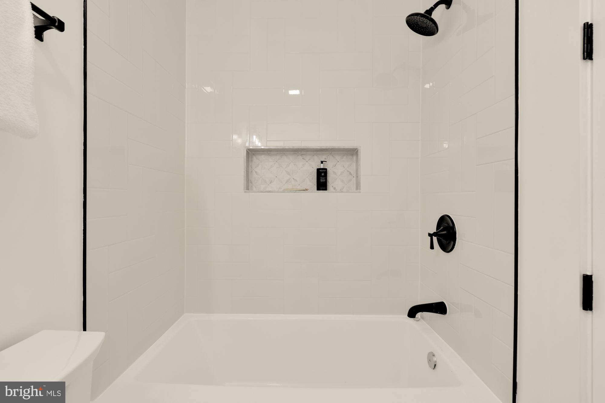 5331 42nd Street Northwest Washington, DC 20015 - Photo 39 of 51 a bathroom with a tub