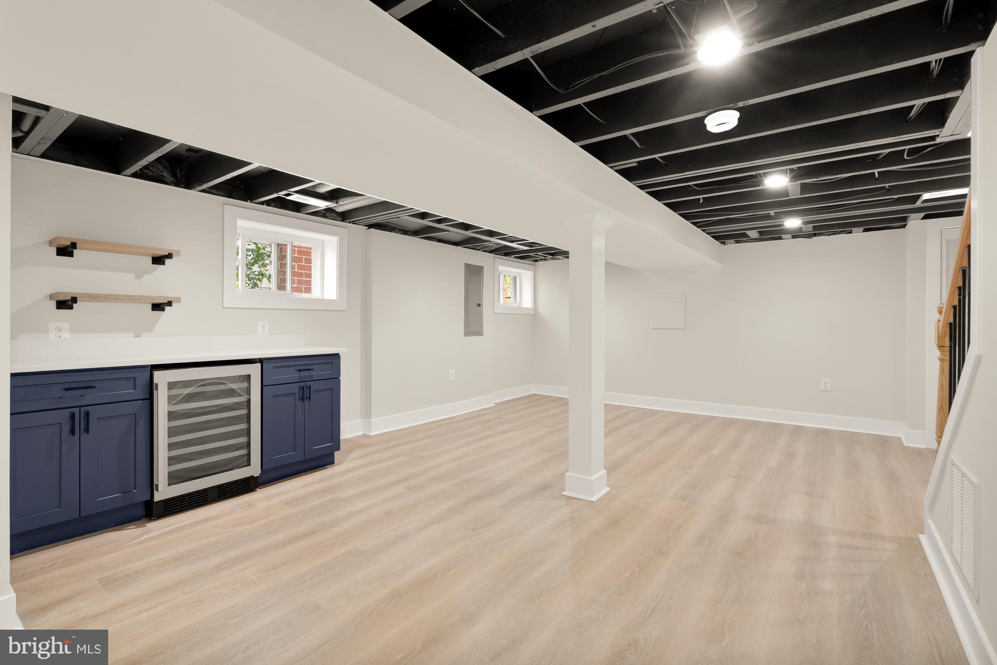 5331 42nd Street Northwest Washington, DC 20015 - Photo 43 of 51 a view of an empty room with furniture and wooden floor
