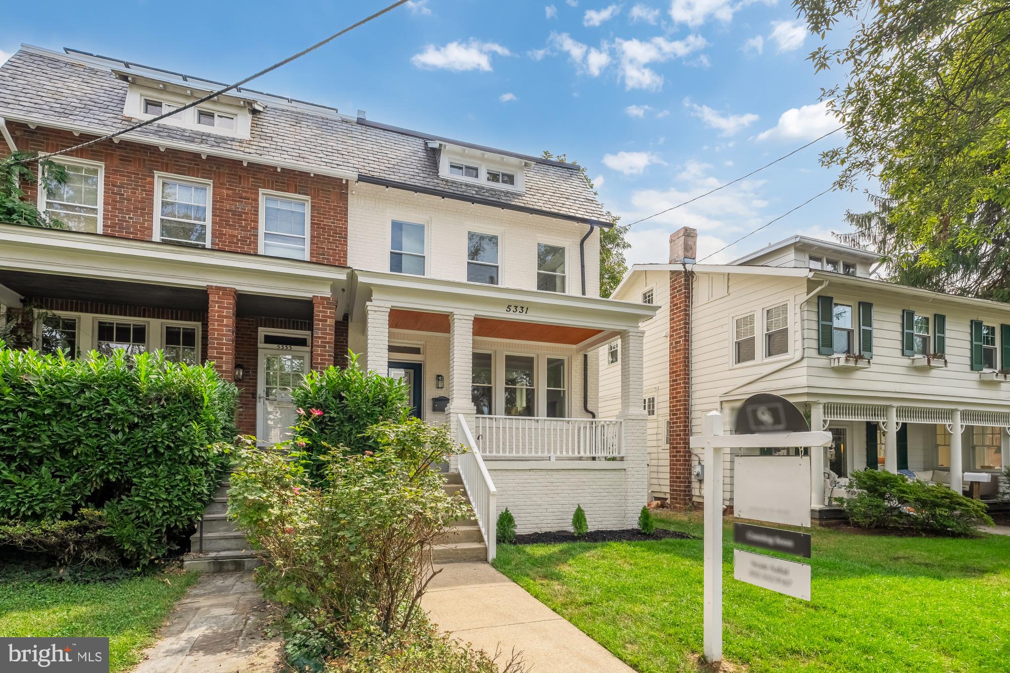 5331 42nd Street Northwest Washington, DC 20015 - Photo 50 of 51 a front view of a house with a yard