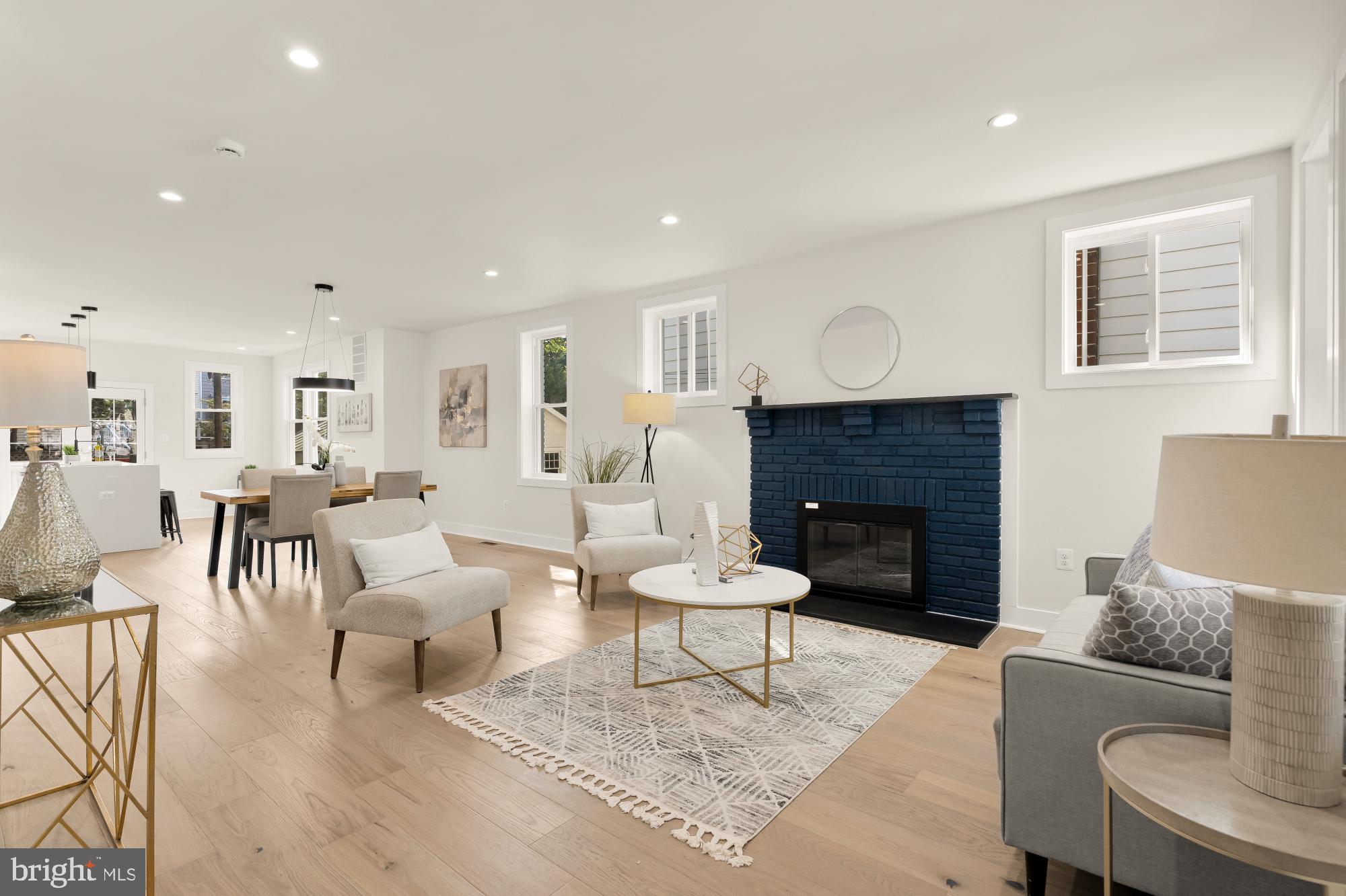 5331 42nd Street Northwest Washington, DC 20015 - Photo 6 of 51 a living room with furniture and a fireplace