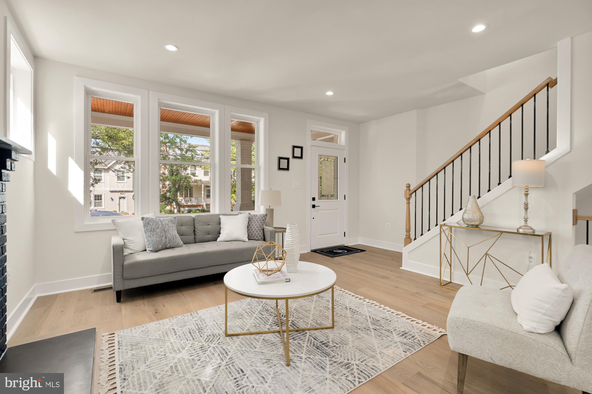 5331 42nd Street Northwest Washington, DC 20015 - Photo 7 of 51 a living room with furniture and a dining table with garden view