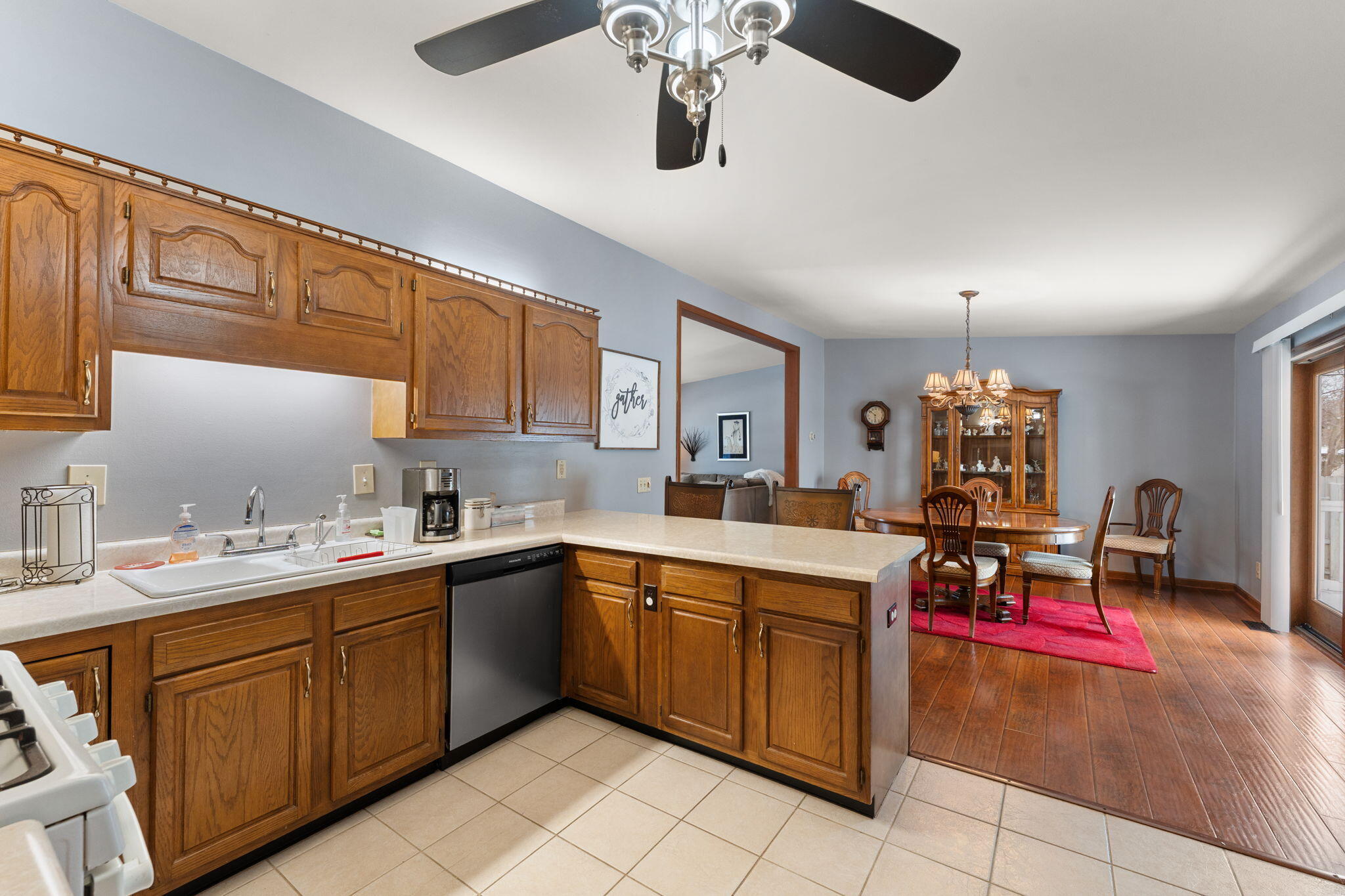 507 South 20th Street Chesterton, IN 46304 - Photo 11 of 27 a kitchen with a sink dishwasher a stove and cabinets