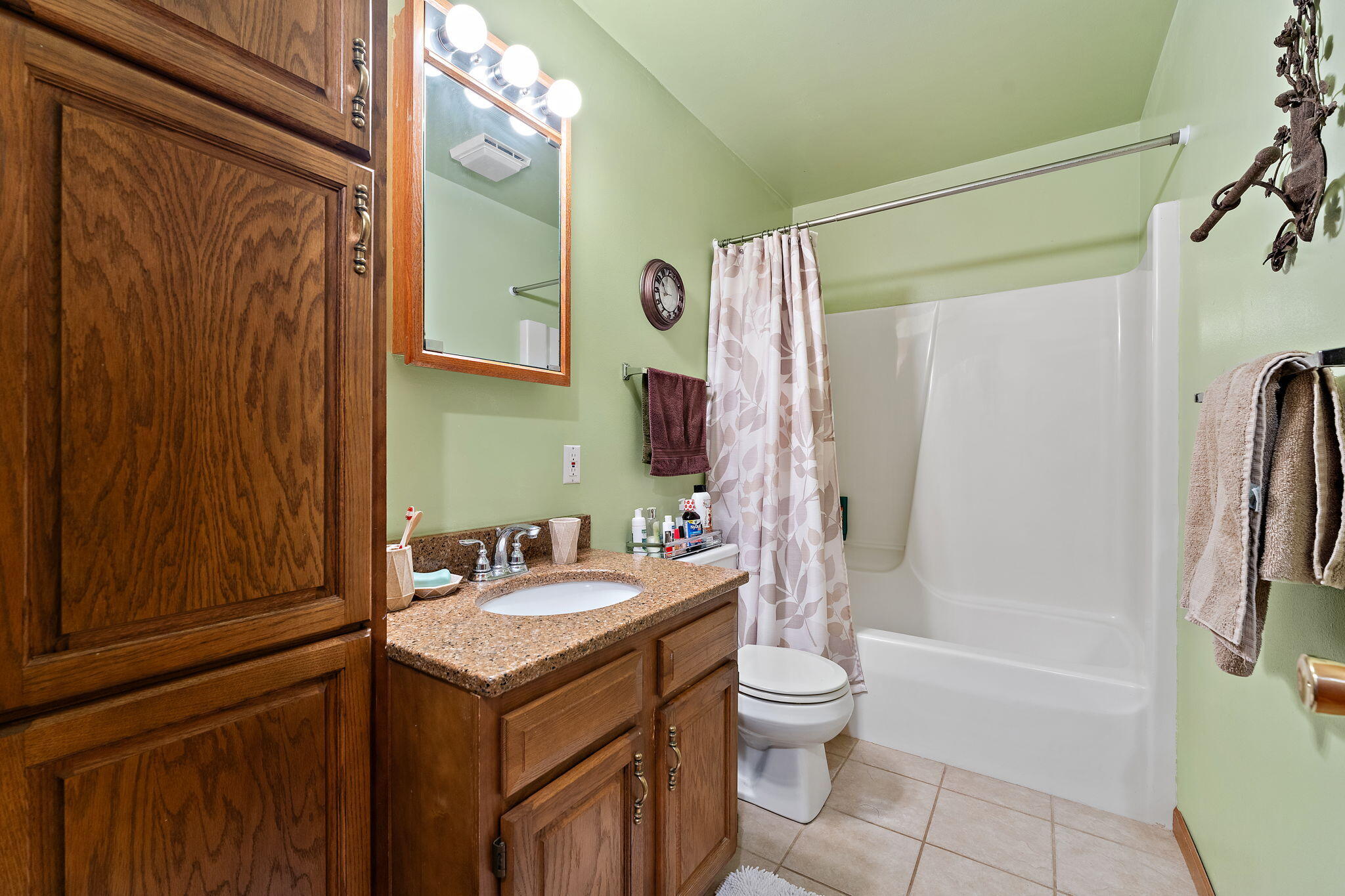 507 South 20th Street Chesterton, IN 46304 - Photo 14 of 27 a bathroom with a sink toilet and shower