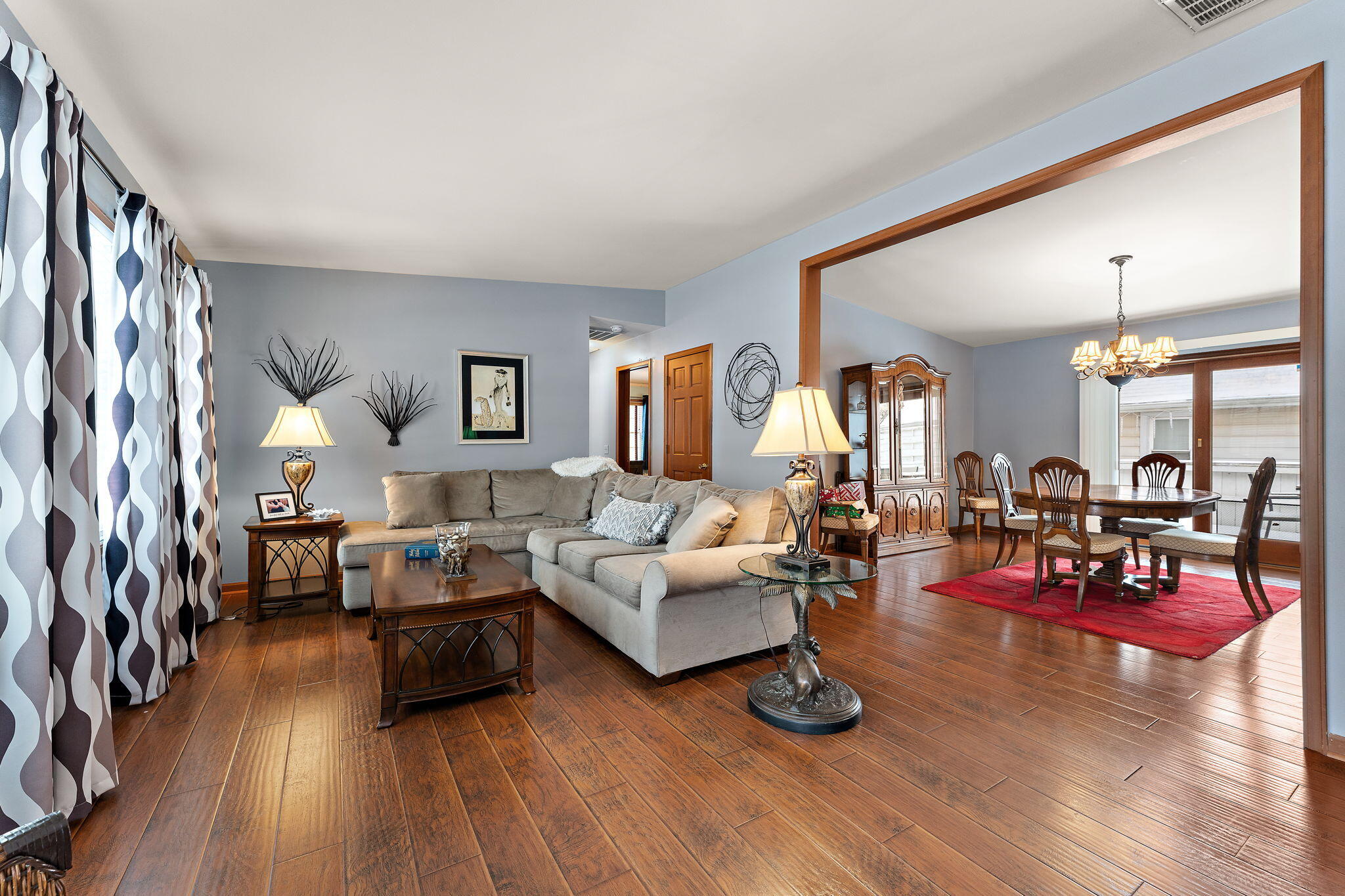 507 South 20th Street Chesterton, IN 46304 - Photo 3 of 27 a living room with furniture and wooden floor