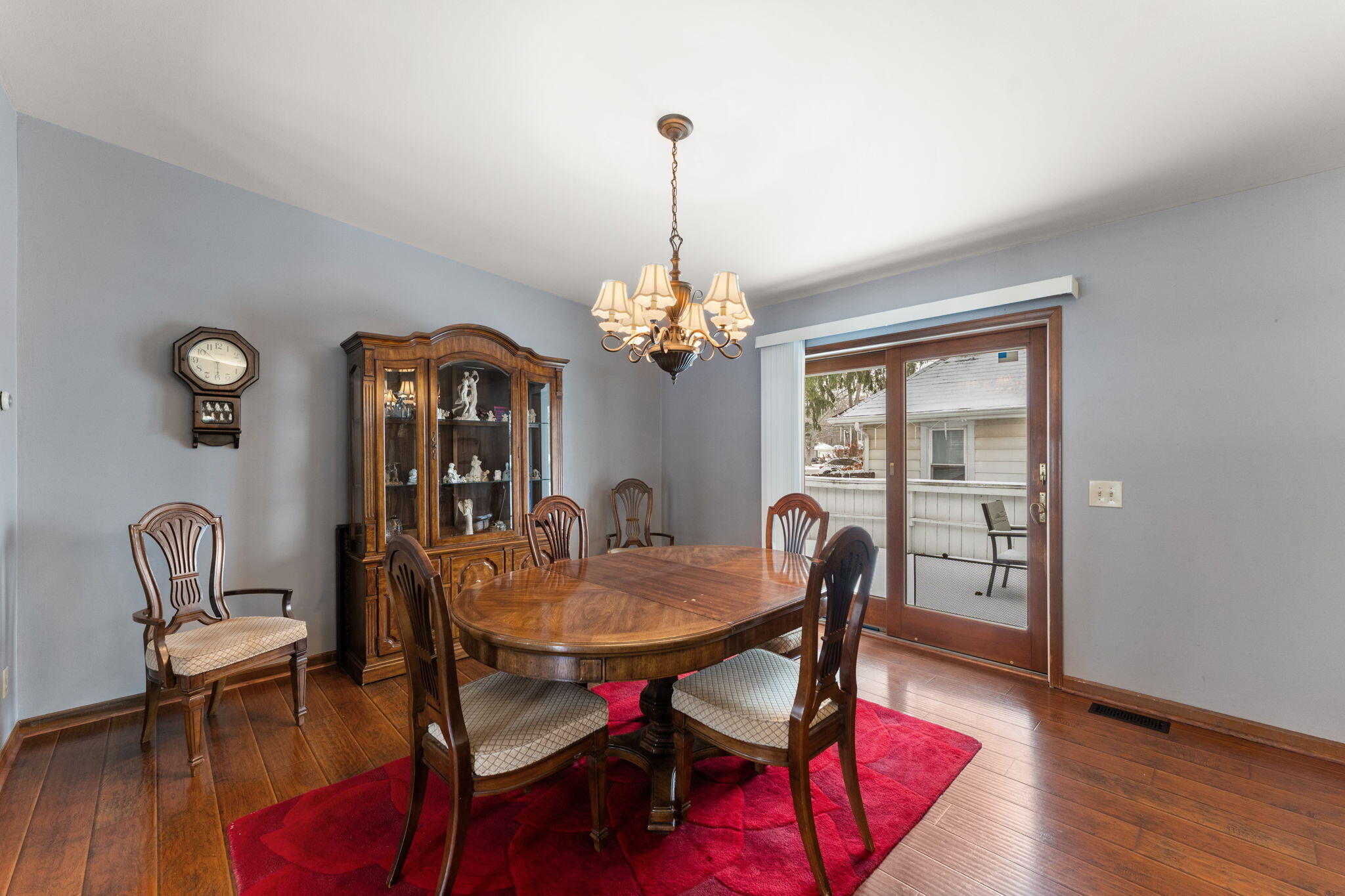 507 South 20th Street Chesterton, IN 46304 - Photo 7 of 27 a dining room with furniture a chandelier and wooden floor