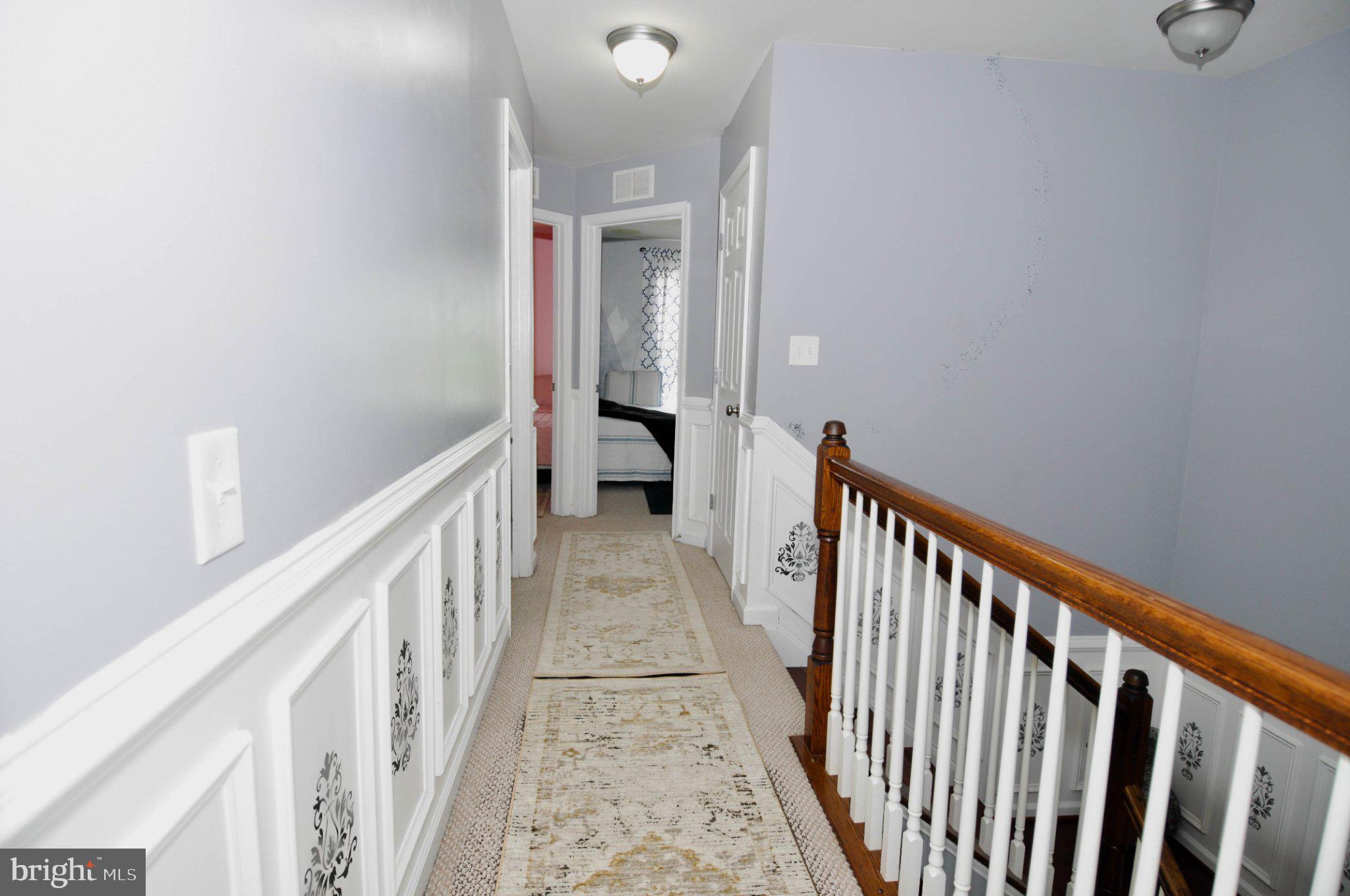17143 Gibson Mill Road Dumfries, VA 22026 - Photo 34 of 35 Charming hallway with elegant details.