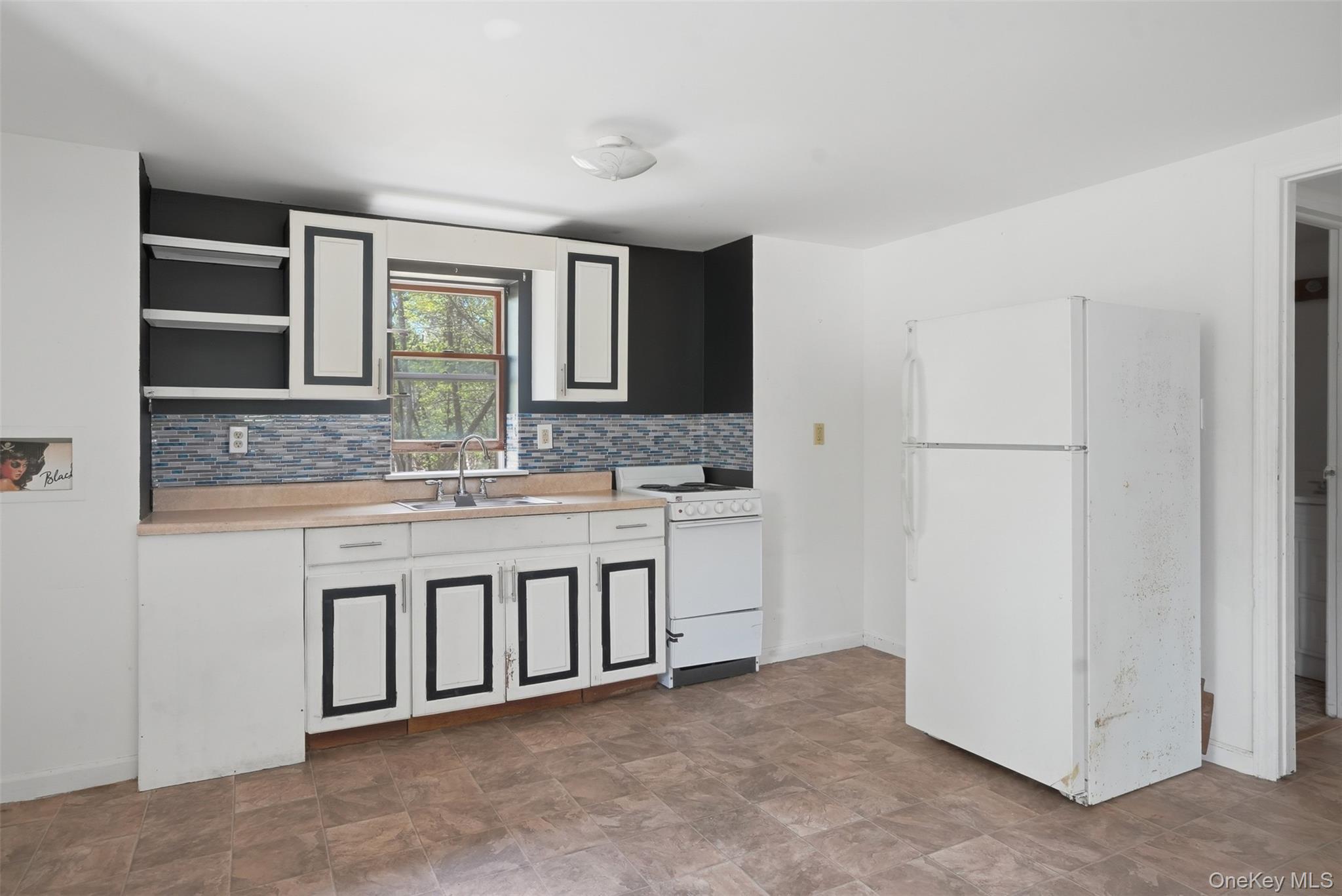 6 Short Road Wurtsboro, NY 12790 - Photo 38 of 48 a view of spacious bathroom with a granite countertop sink and a mirror