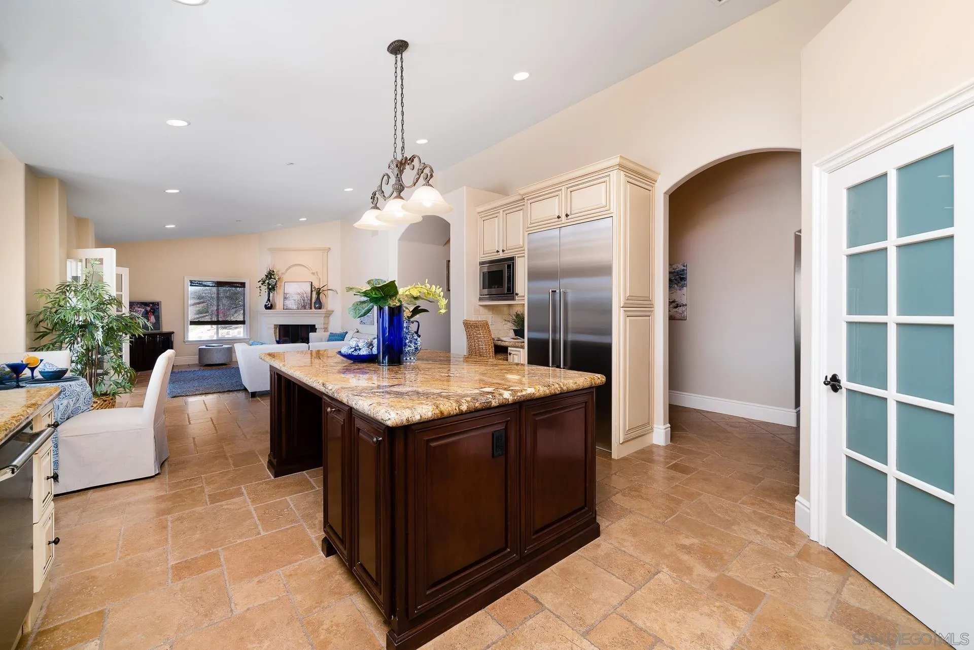 4445 Fallsbrae Road Fallbrook, CA 92028 - Photo 9 of 41 a kitchen with granite countertop a sink and cabinets